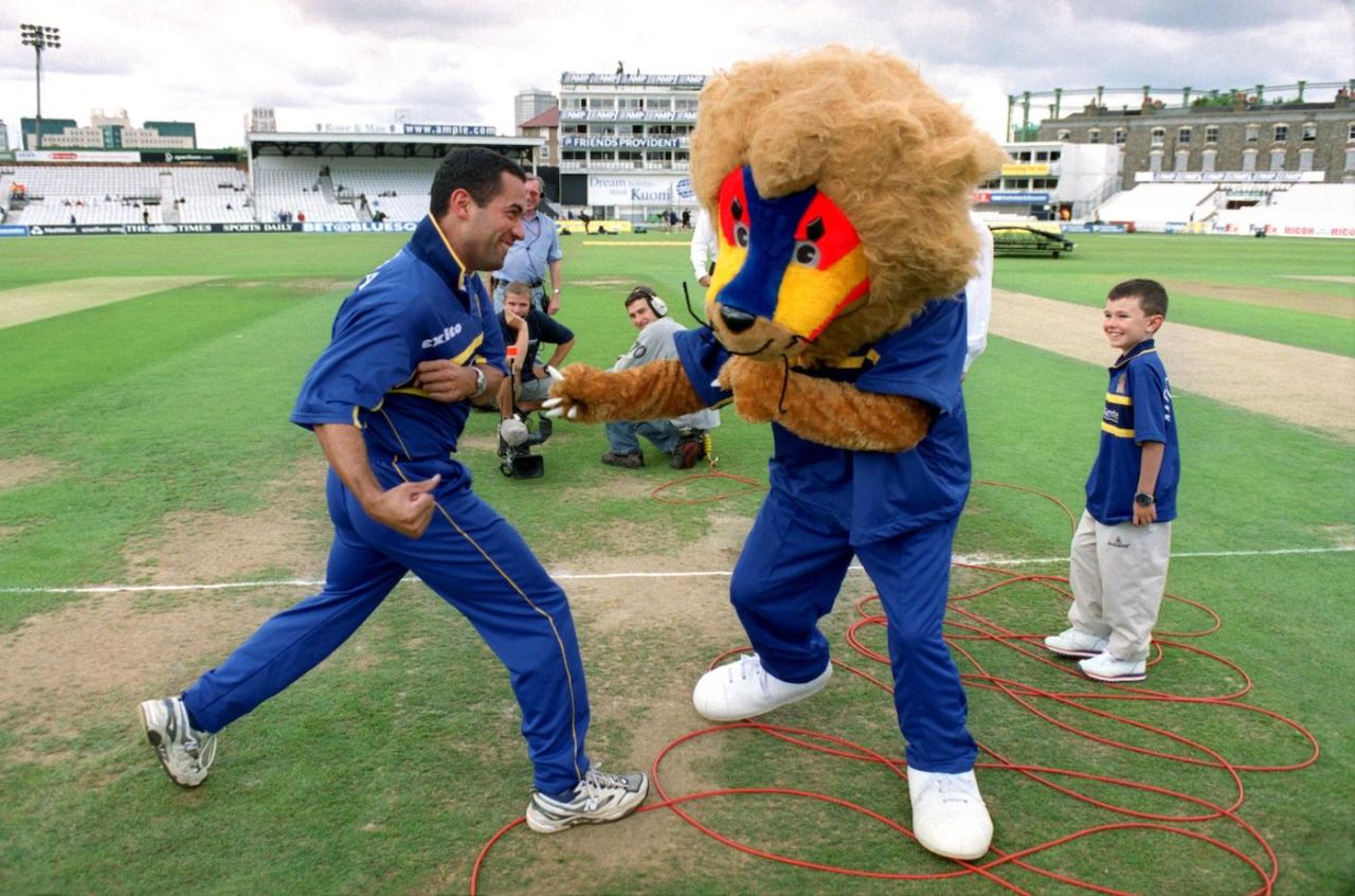 Adam Hollioake engages the Surrey club mascot in a spot of pugilism, Surrey Lions vs Yorkshire Phoenix, Norwich Union League, The Oval, September 03, 2001