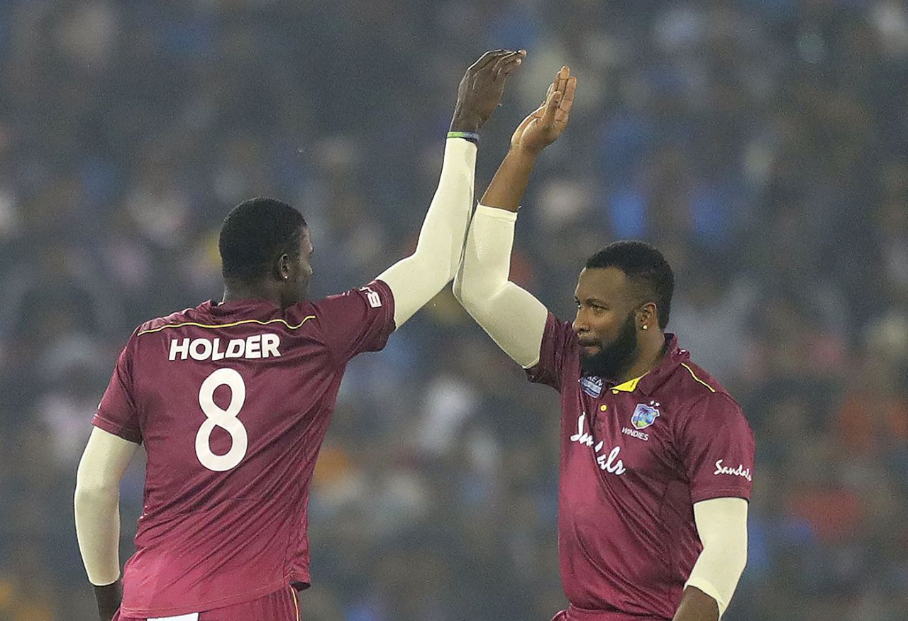 Kieron Pollard and Jason Holder celebrate, India v West Indies, 3rd ODI, Cuttack, December 22, 2019

