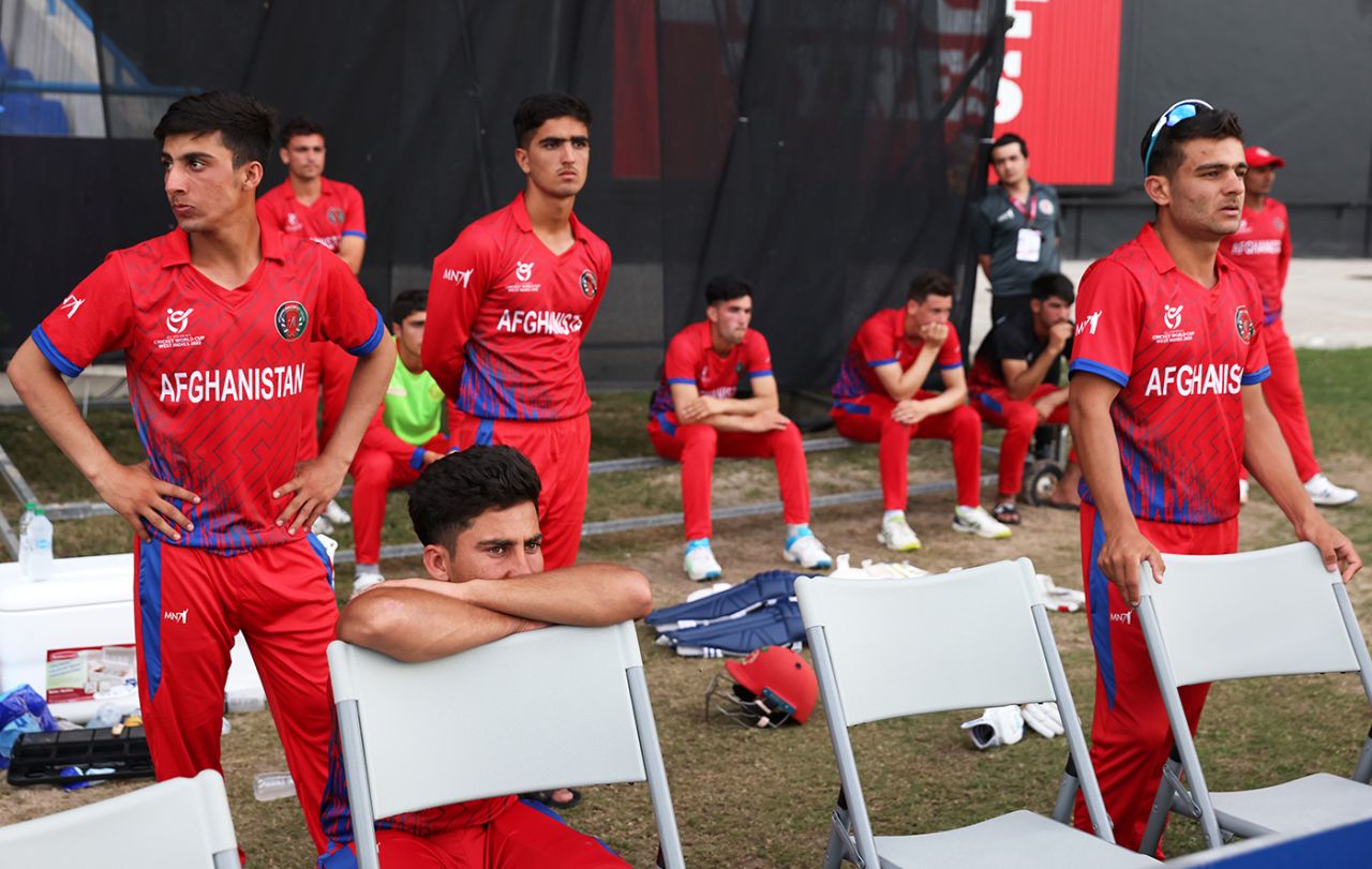 Afghanistan's players contemplate their narrow defeat, England vs Afghanistan, ICC Under-19 World Cup semi-final, Antigua, February 1, 2022