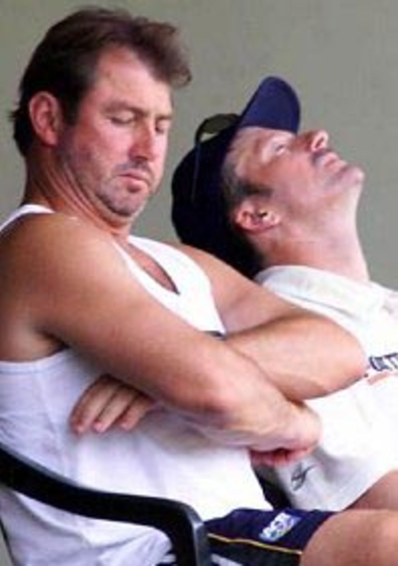 9 Sep 1999: Australian captain Steve Waugh (right) shows the strain while sitting in the dressing room with coach Geoff Marsh, during day one of the First Test between Sri Lanka and Australia at Asgiriya Stadium, Kandy, Sri Lanka.