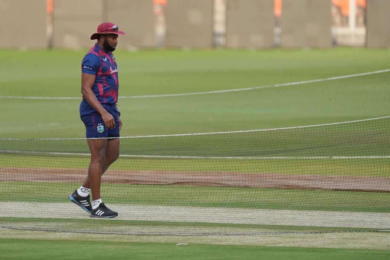 Kieron Pollard has a look at the pitch on the eve of the first ODI, Ahmedabad, February 5, 2022