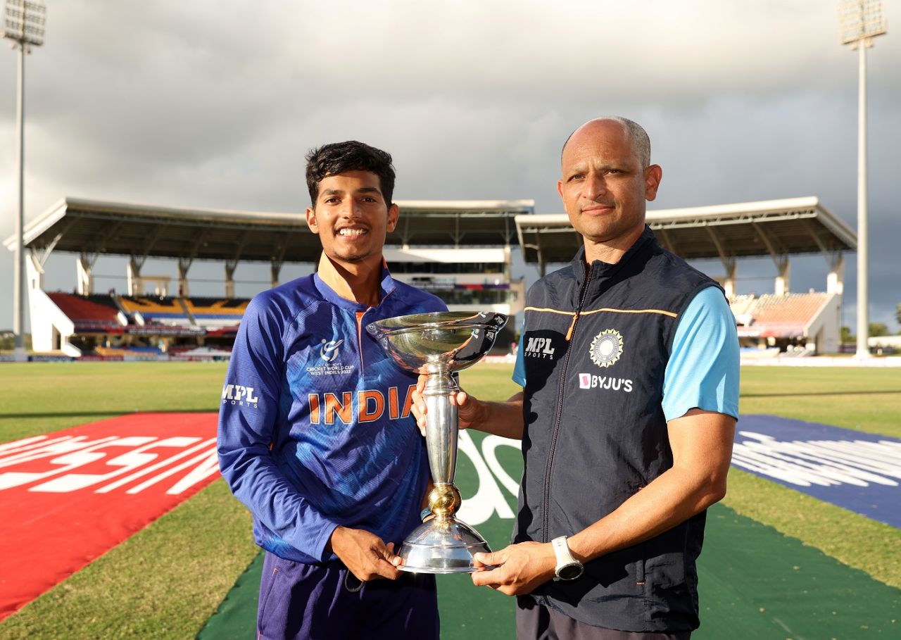 Yash Dhull and Hrishikesh Kanitkar pose with the World Cup trophy, England vs India, Under-19 World Cup final, North Sound, February 5, 2022