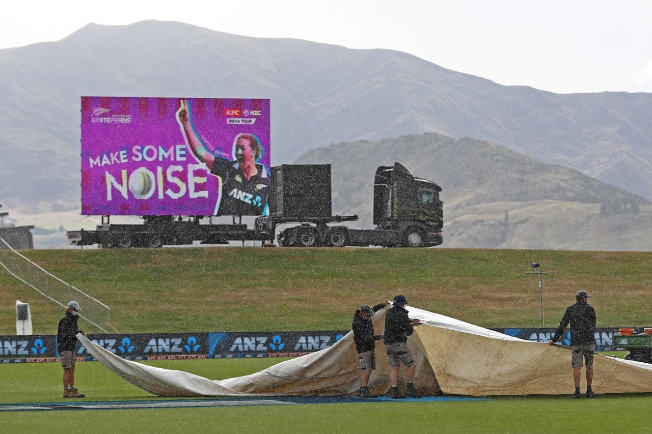 The ground staff remove the covers at the John Davies Oval, New Zealand vs India, 4th Women's ODI, Queenstown, February 22, 2022