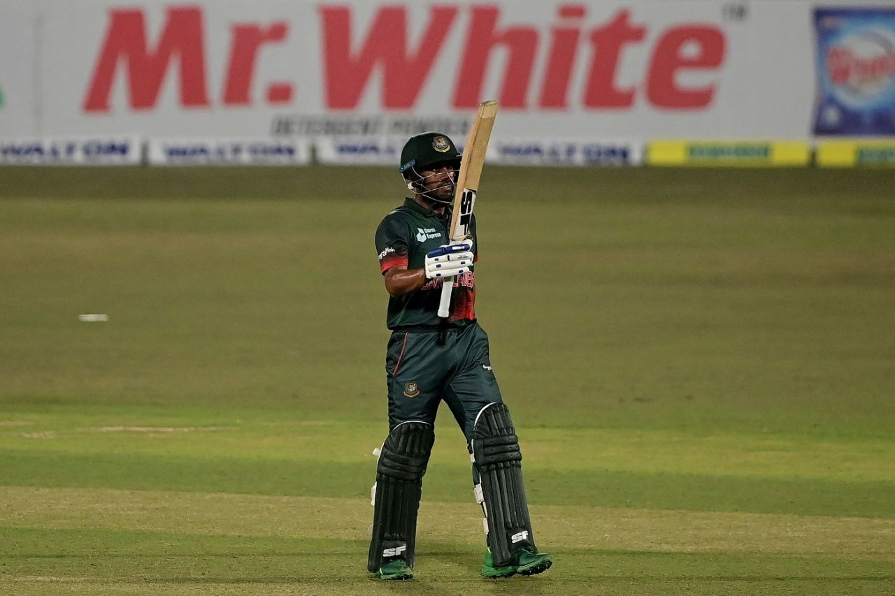 Mehidy Hasan Miraz raises his bat after getting to a fifty, Bangladesh vs Afghanistan, 1st ODI, Chattogram, February 23, 2022
