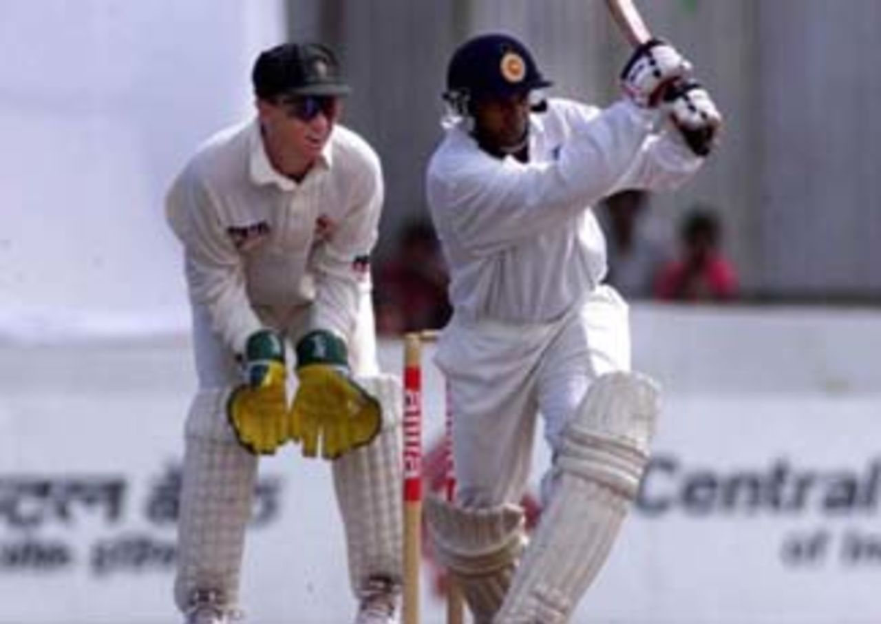 22 Sep 1999: Arivinda de Silva of Sri Lanka on the attack, with Ian Healy of Australia looking on, during day one of the second test between Sri Lanka and Australia at Galle International Stadium, Galle, Sri Lanka.