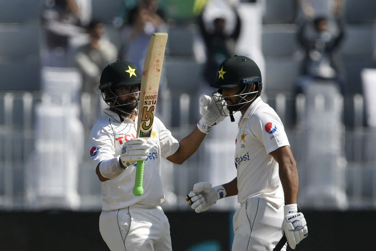 Abdullah Shafique walks up to congratulate Imam-ul-Haq after the latter's half-century, Pakistan vs Australia, 1st Test, Rawalpindi, 1st day, March 4, 2022