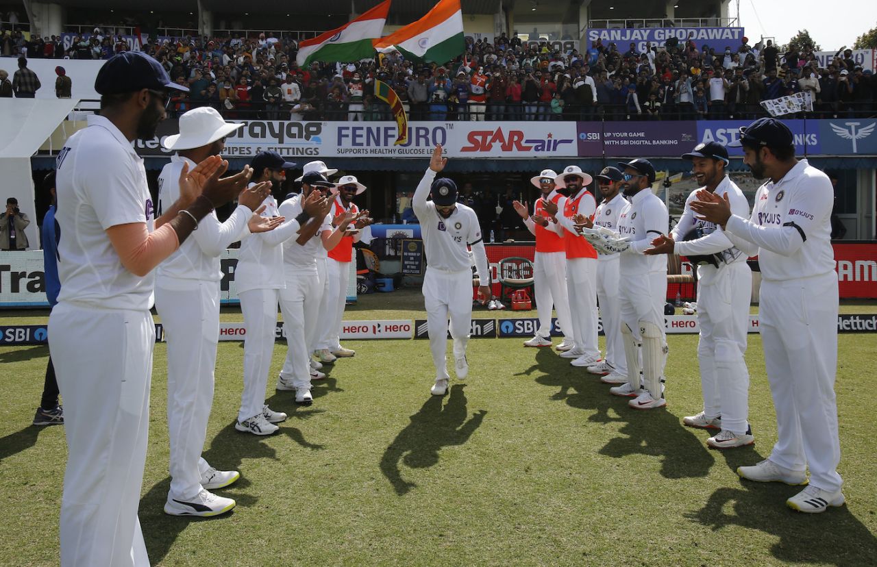 The Indian players give Virat Kohli a guard of honour on the occasion of his 100th Test, India vs Sri Lanka, 1st Test, Mohali, 2nd day, March 5, 2022