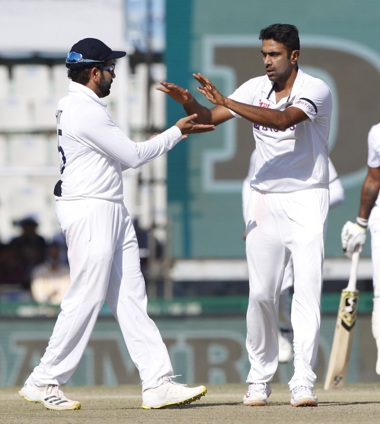 R Ashwin celebrates with Rohit Sharma after picking up Lahiru Thirimanne's wicket, India vs Sri Lanka, 1st Test, Mohali, 2nd day, March 5, 2022