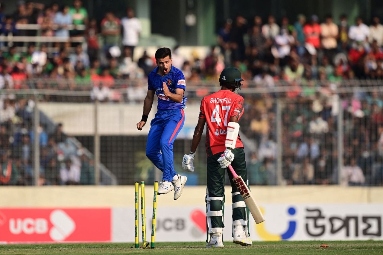 Fazalhaq Farooqi leaps in celebration after getting Shoriful Islam with a yorker, Bangladesh vs Afghanistan, 2nd T20I, Dhaka, March 5, 2022