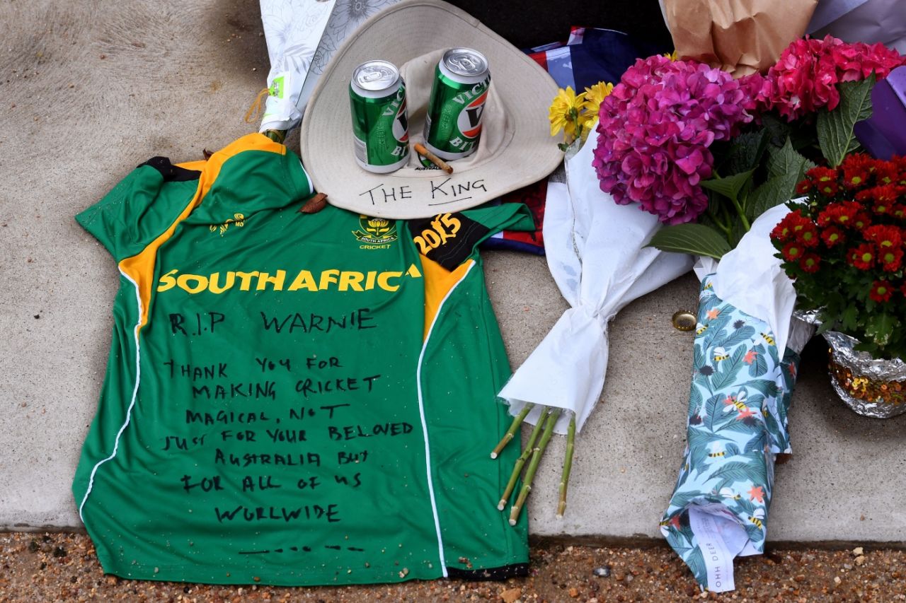 Tributes left by fans at Shane Warne's statue outside the MCG, Melbourne, March 6, 2022