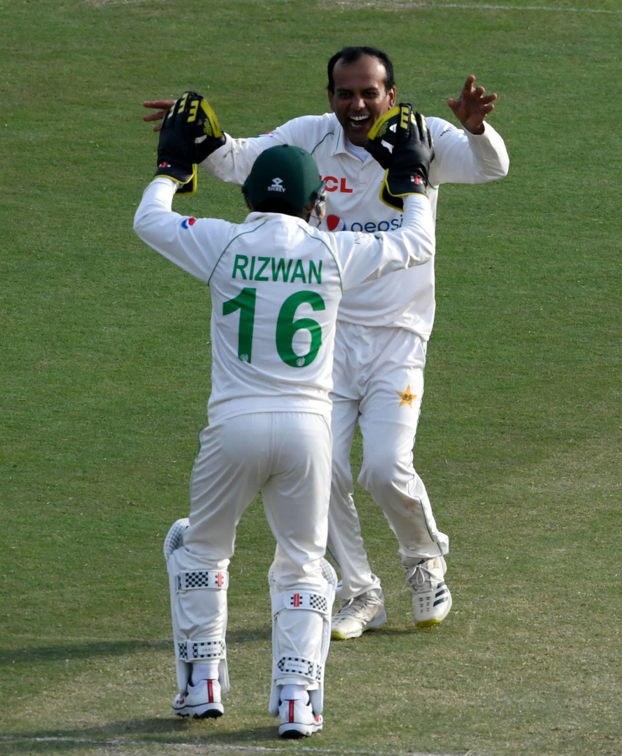 Nauman Ali shares a laugh with Mohammad Rizwan after picking up the wicket of Cameron Green, Pakistan vs Australia, 1st Test, Rawalpindi, 4th day, March 7, 2022