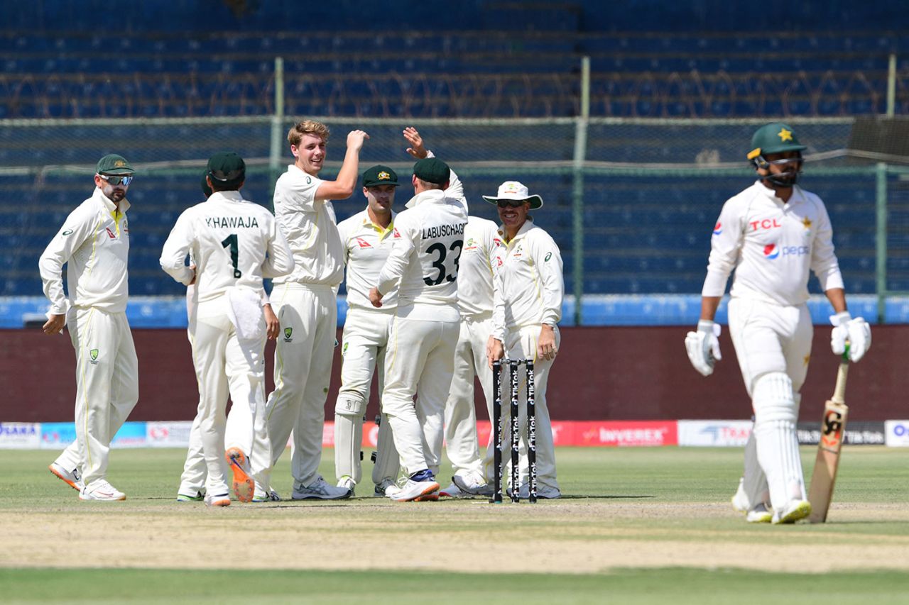 Pat Cummins celebrates the wicket of Mohammad RizwanCameron Green added to Australia's rapid inroadsKarachi, March 14, 2022