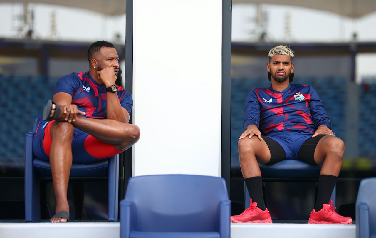 Kieron Pollard and Nicholas Pooran chat outside the dressing room ahead of the match, England vs West Indies, Men's T20 World Cup 2021, Super 12s, Dubai, October 23, 2021