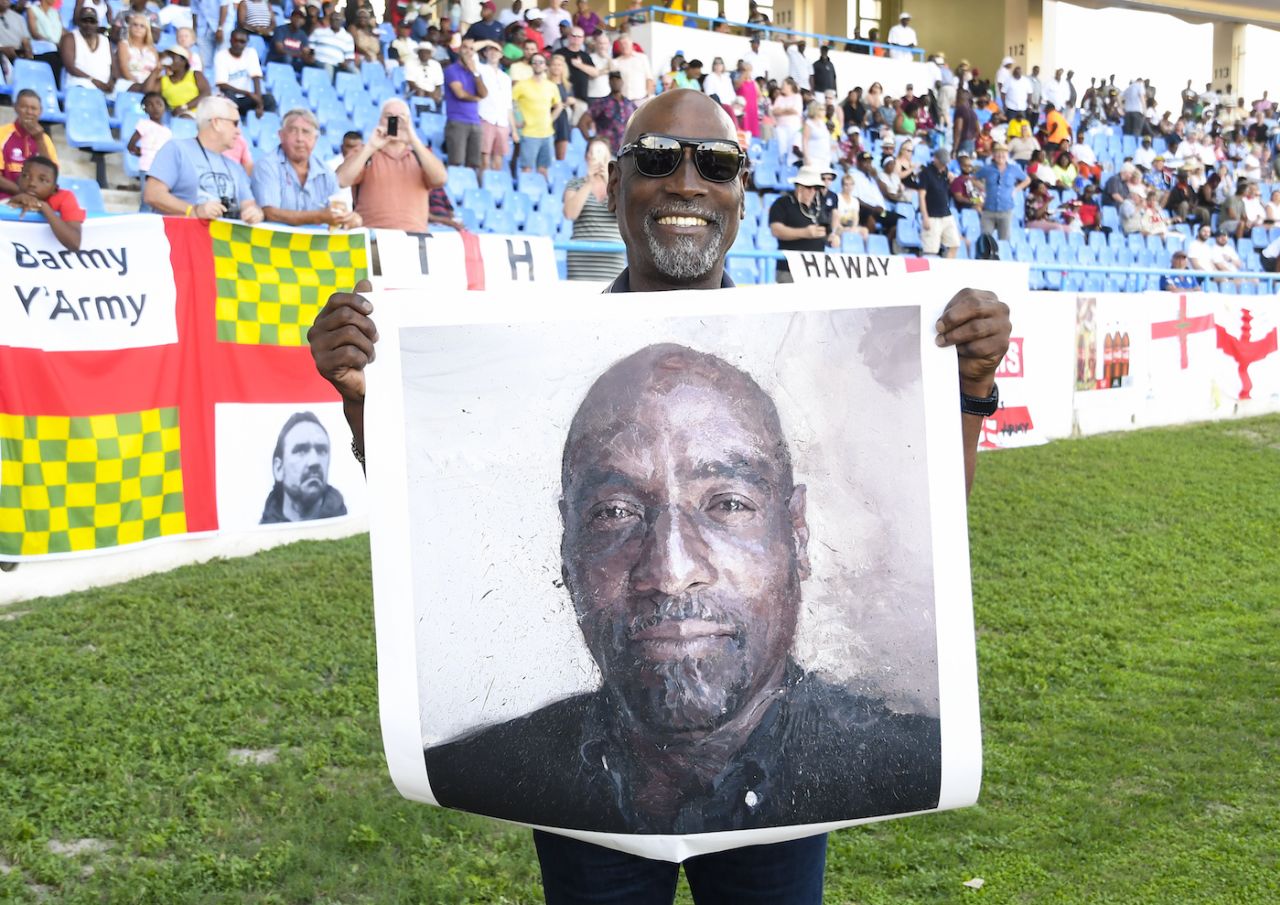 Viv Richards holds up a portrait of himself by artist Brandon Kelly, West Indies v England, 2nd Test, 3rd day, Antigua, February 2, 2019