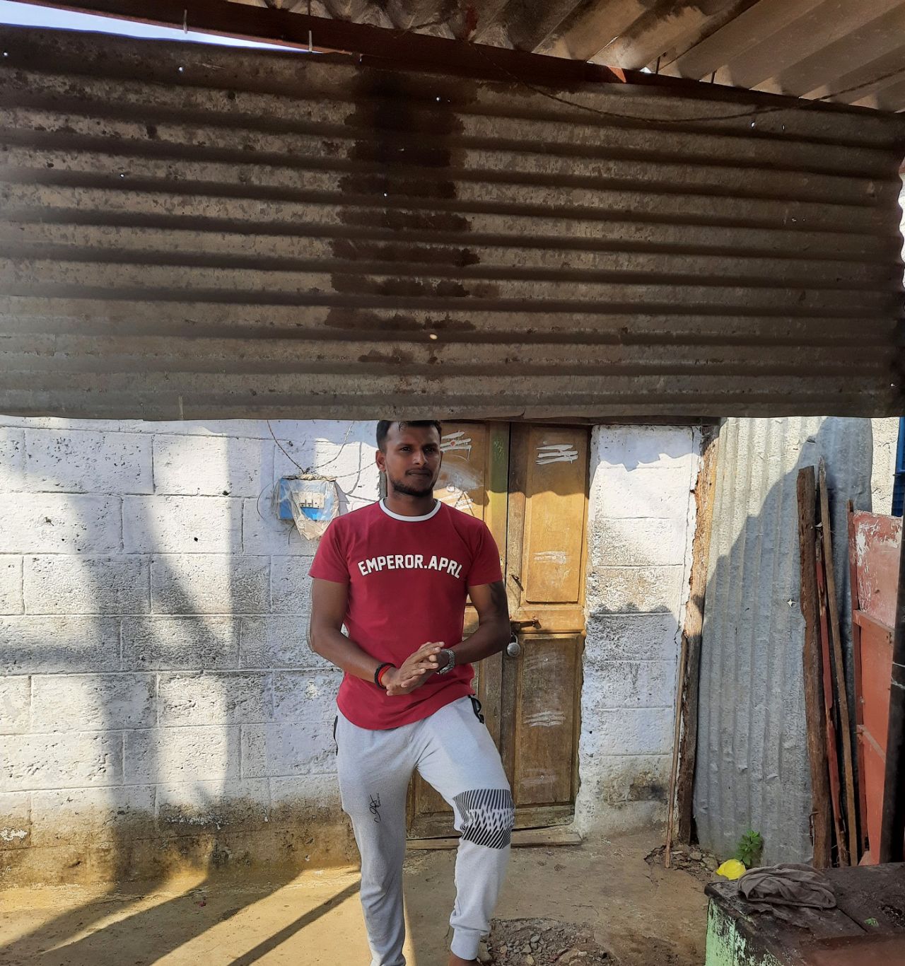 T Natarajan stands outside his old, one-room house Chinnappampatti