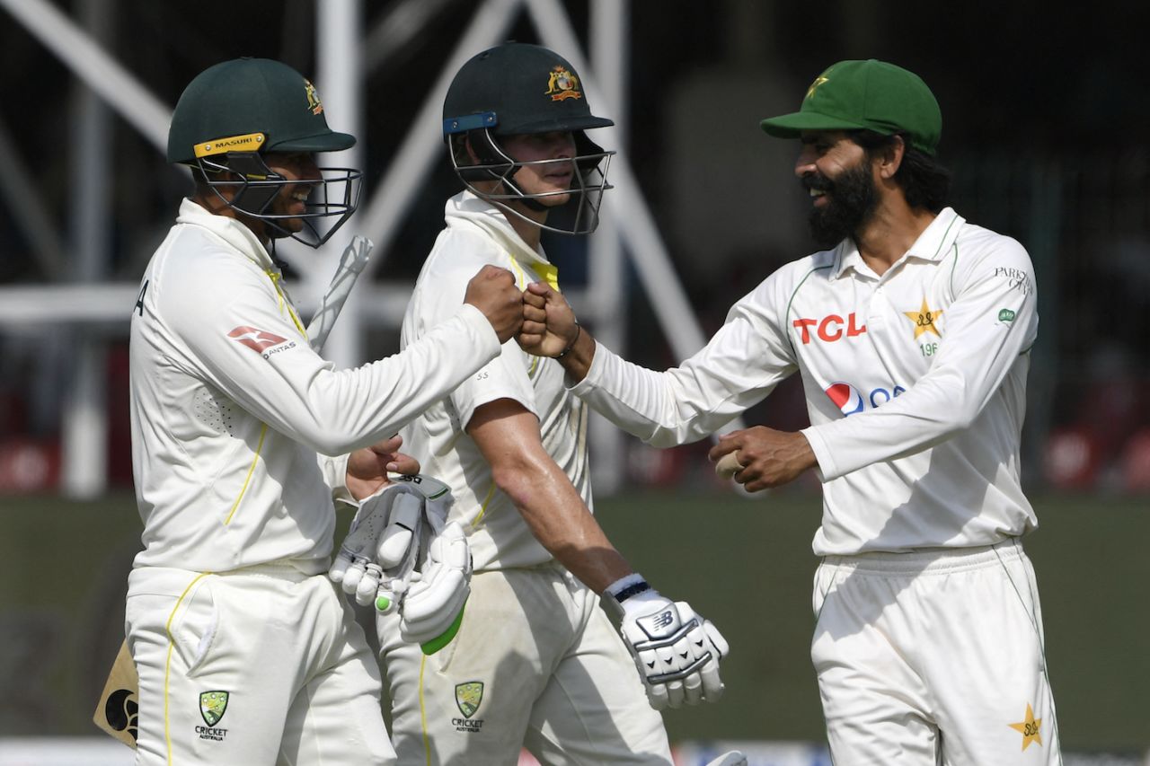 Fawad Alam congratulates Usman Khawaja for his century, Pakistan vs Australia, 3rd Test, Lahore, 4th day, March 24, 2022