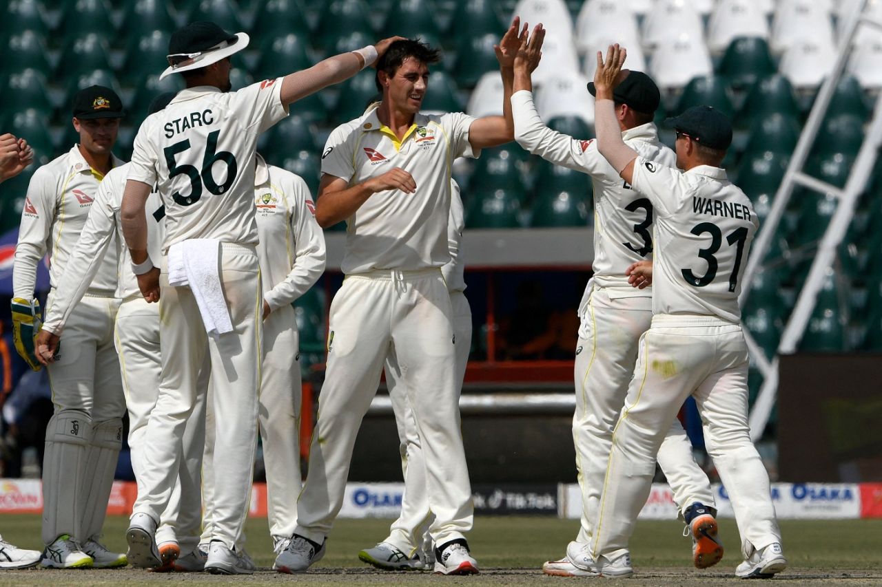 Pat Cummins celebrates with team-mates after dismissing Fawad Alam, Pakistan vs Australia, 3rd Test, Lahore, 5th day, March 25, 2022