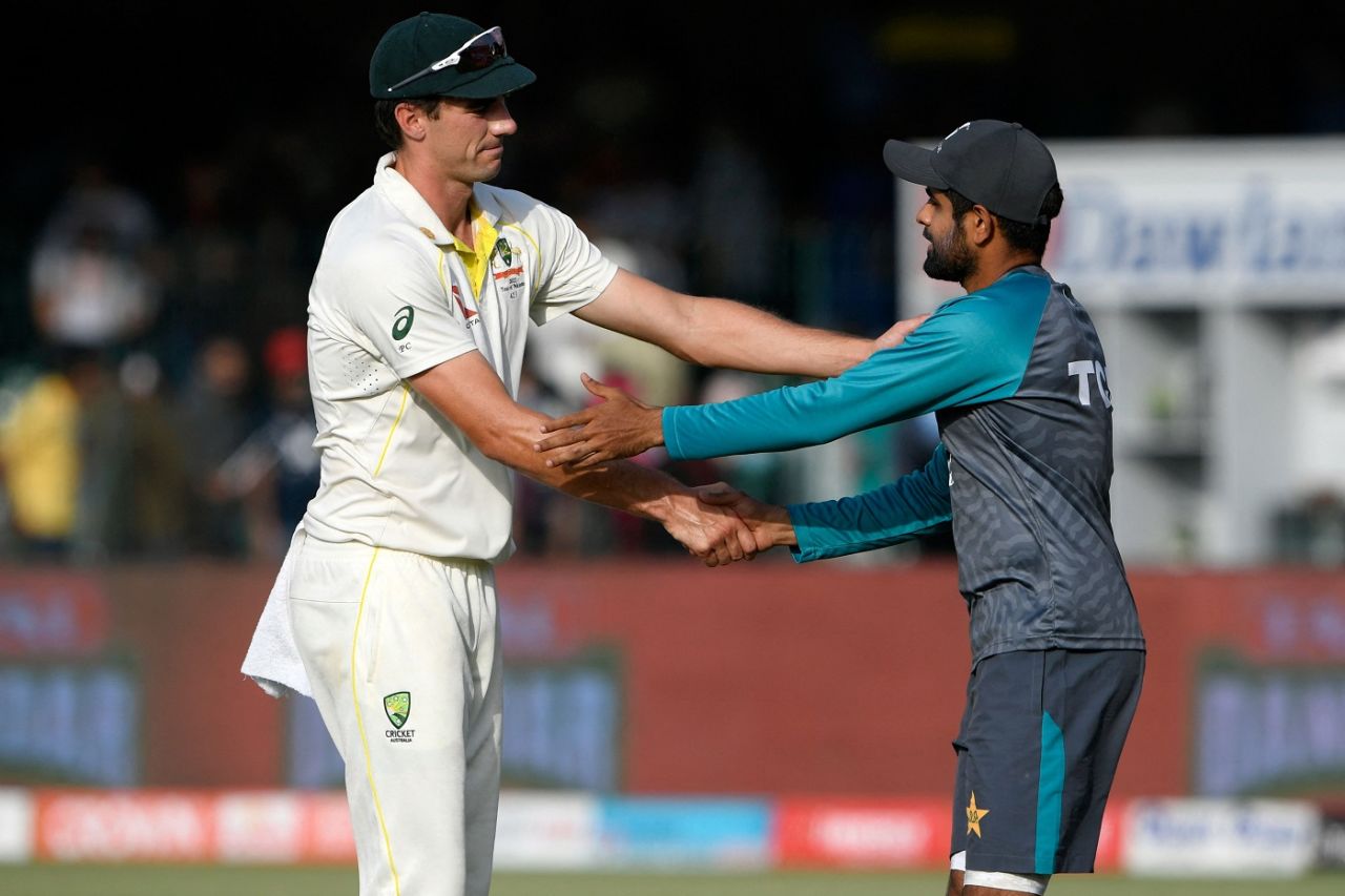 Pat Cummins and Babar Azam greet each other after Australia won the series against Pakistan, Pakistan vs Australia, 3rd Test, Lahore, 5th day, March 25, 2022