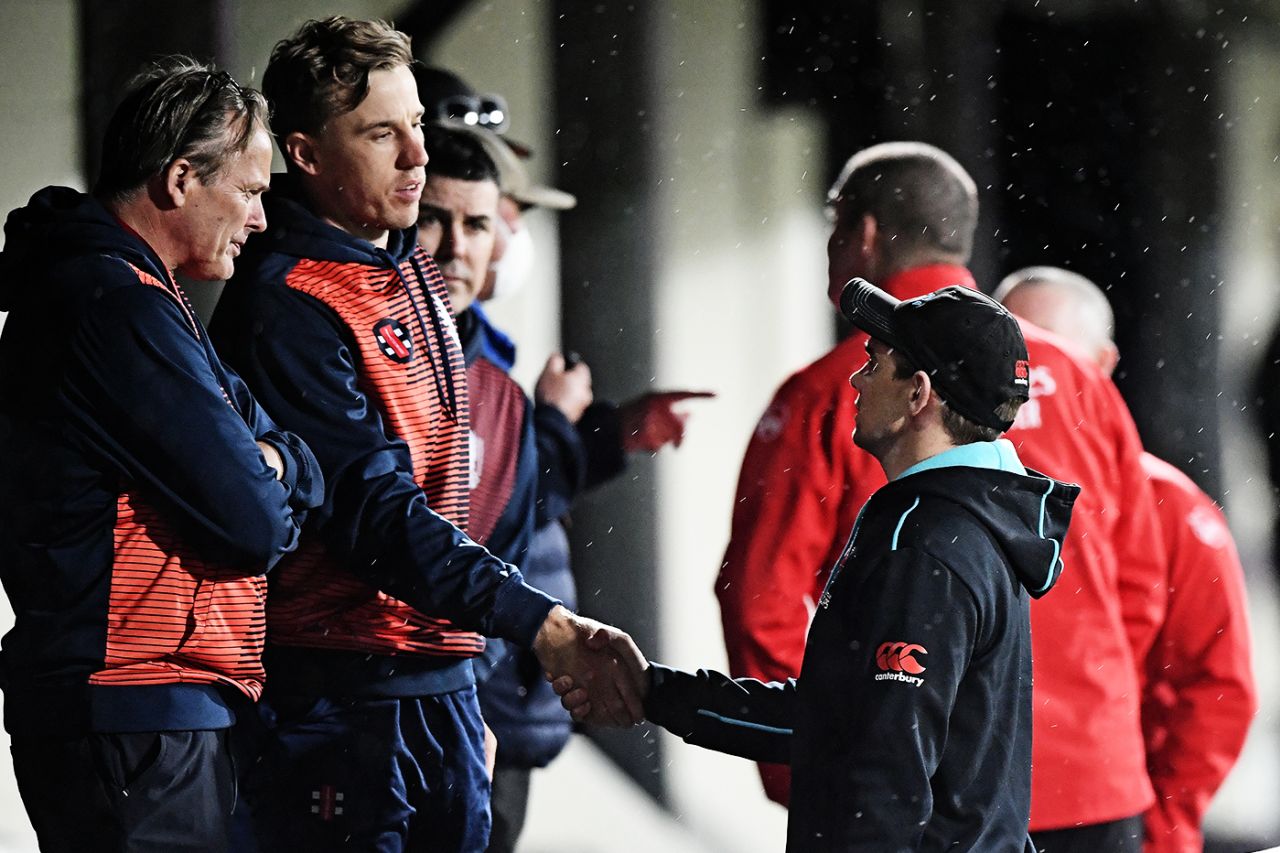 Logan van Beek shakes hands with Tom Latham, New Zealand vs Netherlands, Only T20I, Napier, March 25, 2022