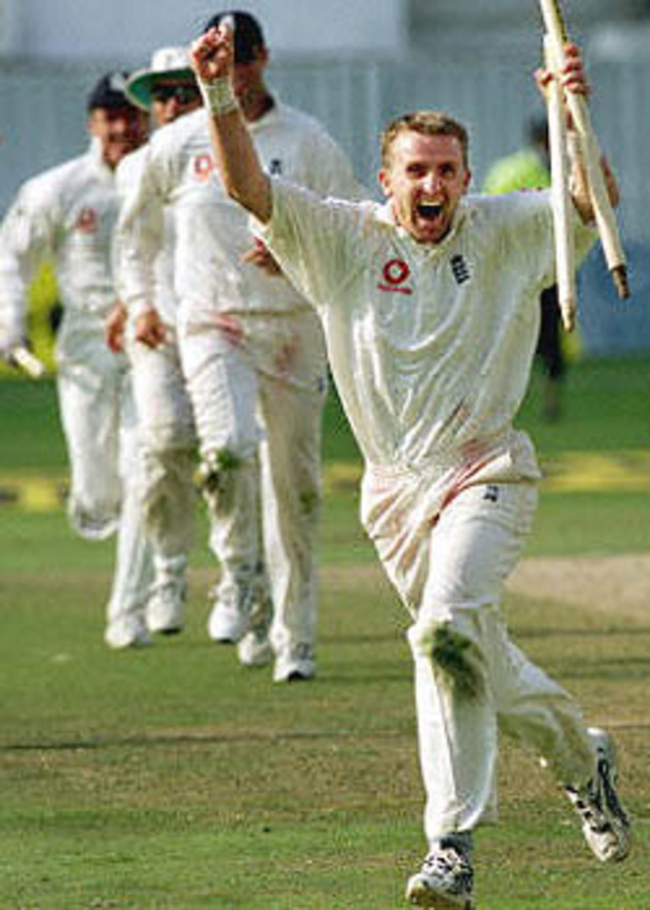 England's Dominic Cork runs off the field with the stumps after bowling out Courtney Walsh, of the West Indies, to win the Fifth Test at the Oval in London. England won the five-match series 3-1 breaking the longest running losing streak in test cricket. The Wisden Trophy, 2000, 5th Test, England v West Indies, Kennington Oval, London, 31Aug-04Sep 2000 (Day 5).