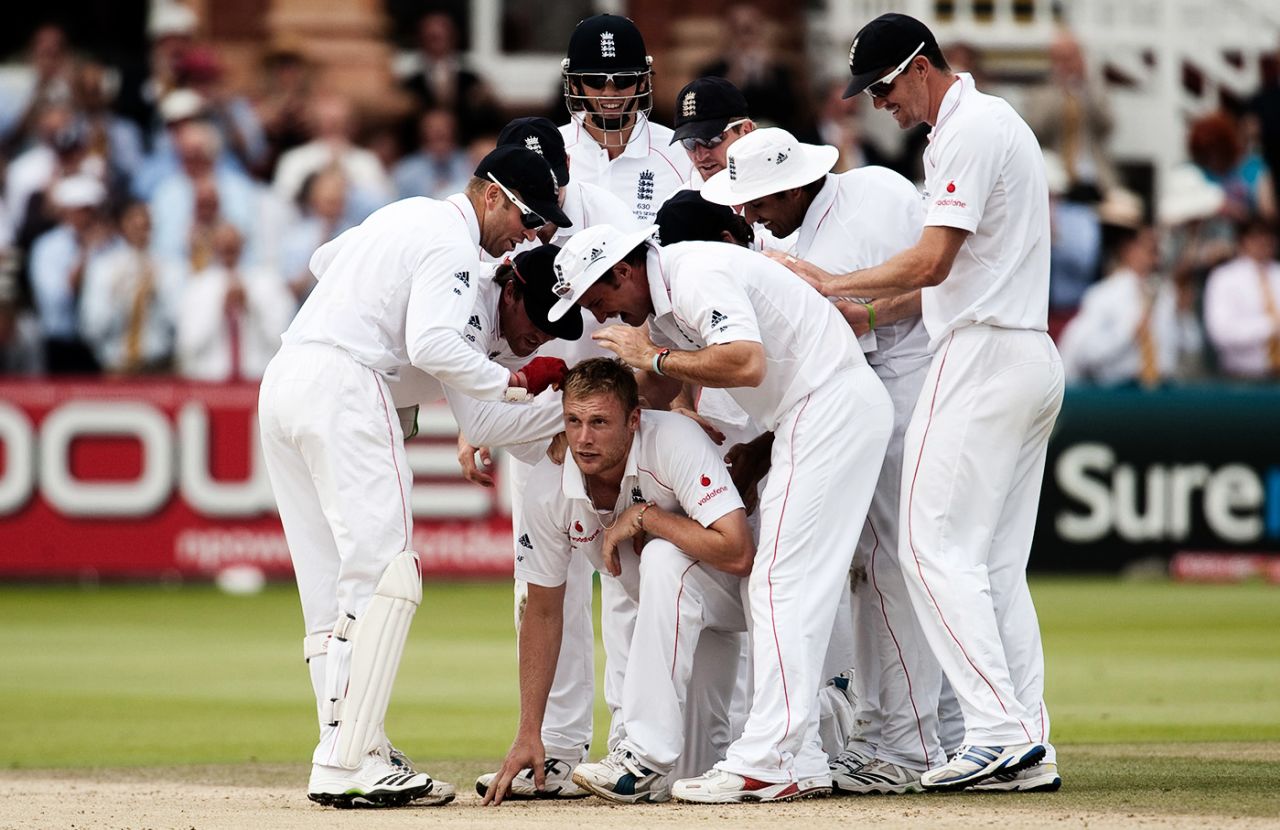 Andrew Flintoff is surrounded by his team-mates, England v Australia, 2nd Test, Lord's, 5th day, July 20, 2009