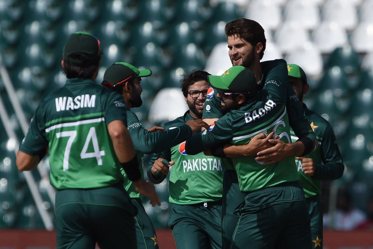 Shaheen Shah Afridi is engulfed by his team-mates after dismissing Travis Head on the first ball, Pakistan vs Australia, 3rd ODI, Lahore, April 2, 2022