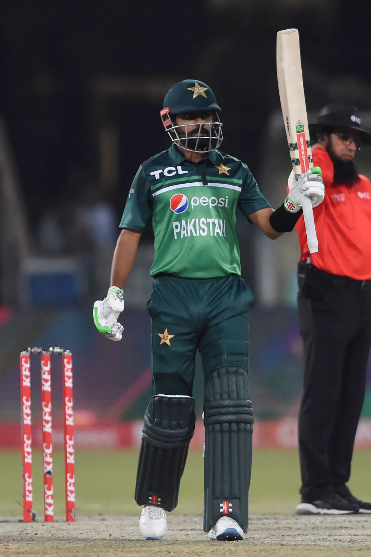 Babar Azam raises his bat, Pakistan vs Australia, 3rd ODI, Lahore, April 2, 2022