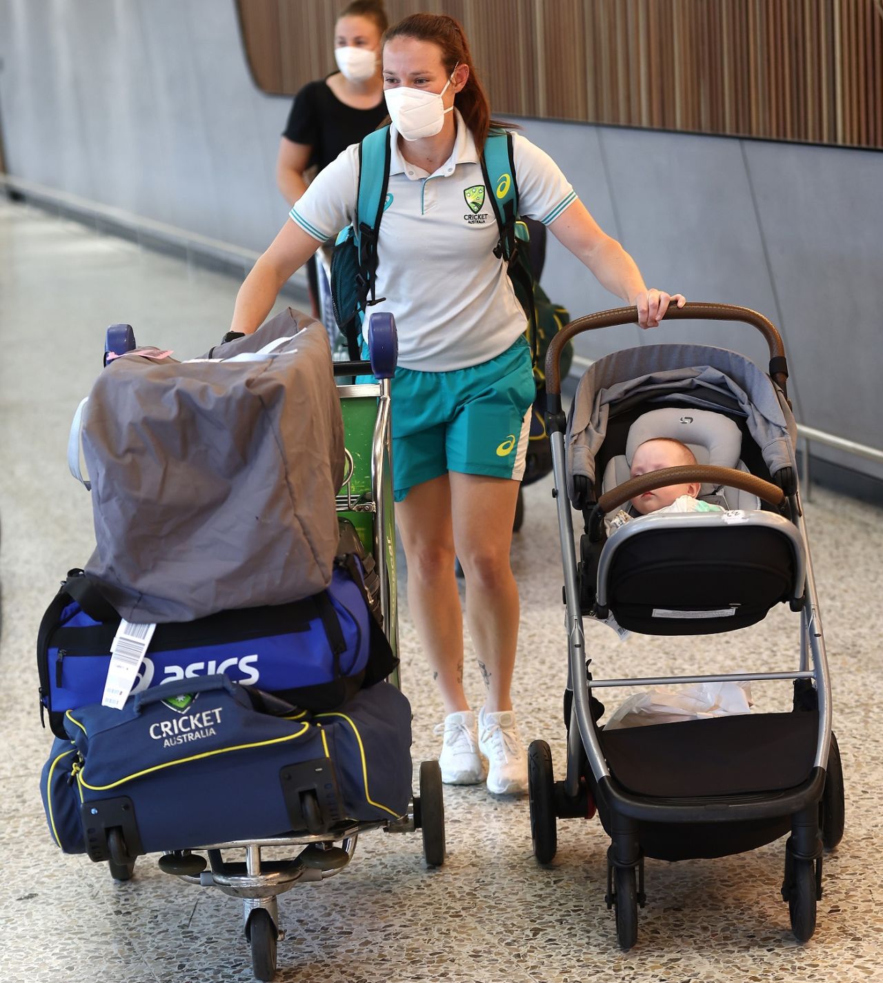 Megan Schutt arrives in Melbourne with her baby after the World Cup win, Women's World Cup 2022, April 5, 2022