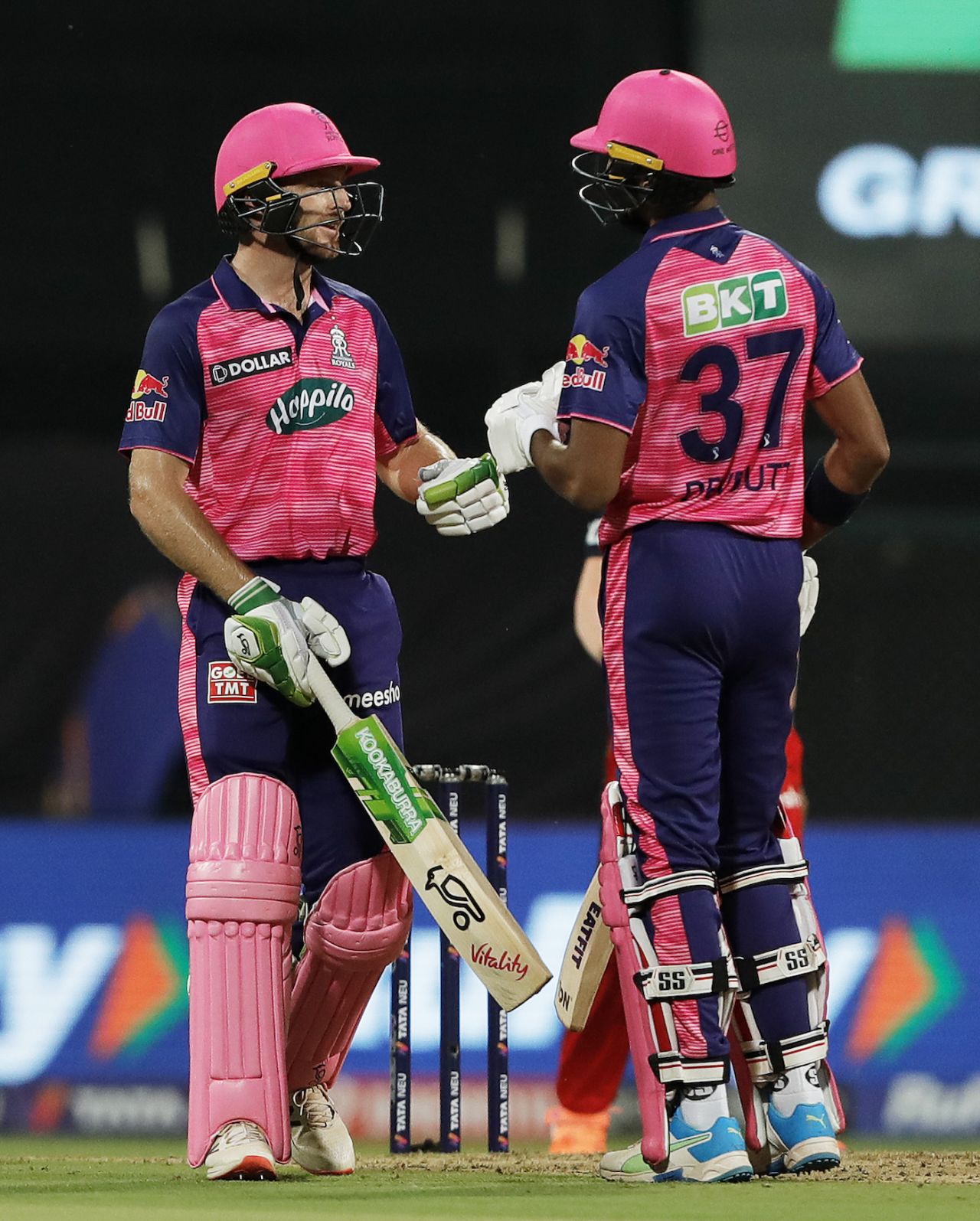 Jos Buttler and Devdutt Padikkal compare notes during their half-century stand, Rajasthan Royals vs Royal Challengers Bangalore, IPL 2022, Mumbai, April 5, 2022