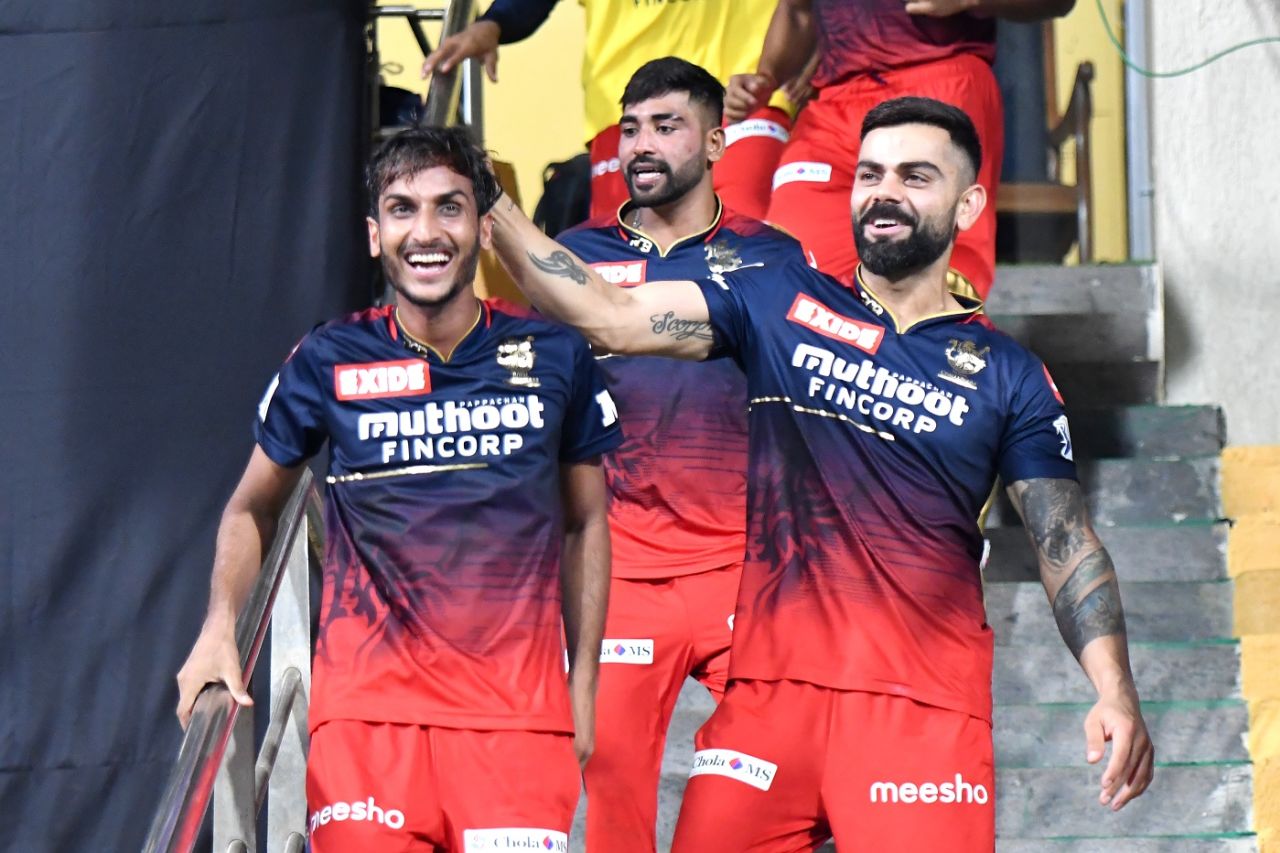 Shahbaz Ahmed gets a pat on the head from Virat Kohli, Rajasthan Royals v Royal Challengers Bangalore, IPL 2022, Wankhede Stadium, April 5, 2022