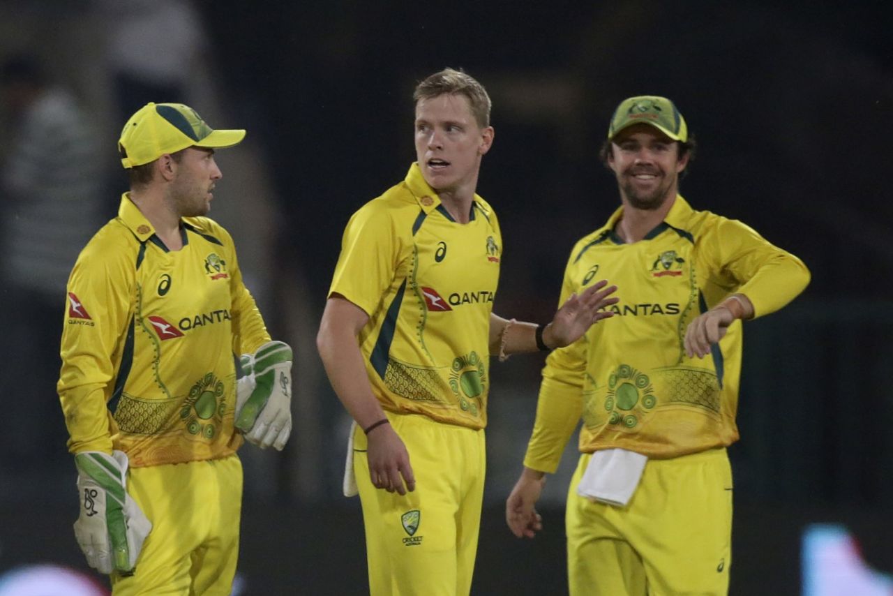 Nathan Ellis celebrates a wicket with Josh Inglis and Travis Head, Pakistan vs Australia, Only T20I, Lahore, April 5, 2022