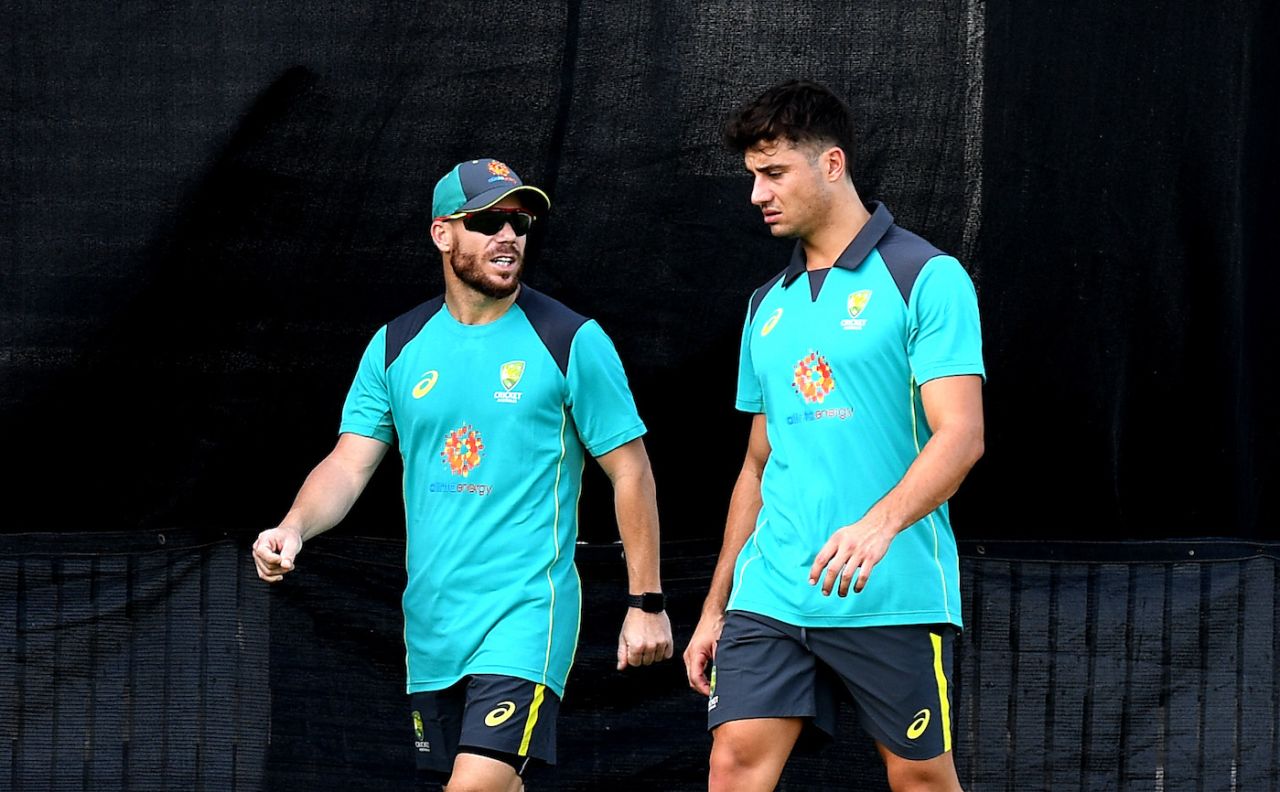 David Warner chats with Marcus Stoinis during a training session, Brisbane, May 3, 2019