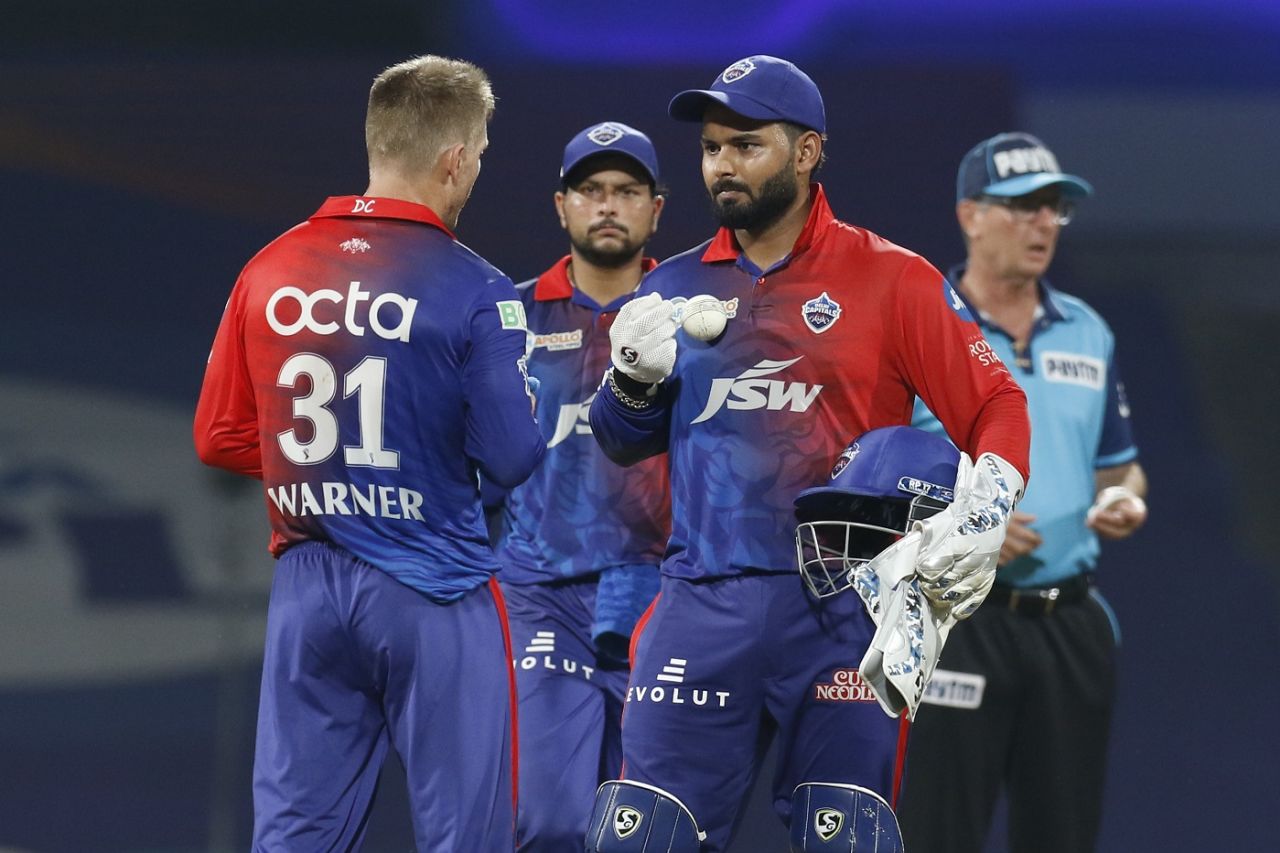 Rishabh Pant and David Warner have a chat after Anrich Nortje had to be taken off the attack, Lucknow Super Giants vs Delhi Capitals, IPL 2022, Navi Mumbai, April 7, 2022