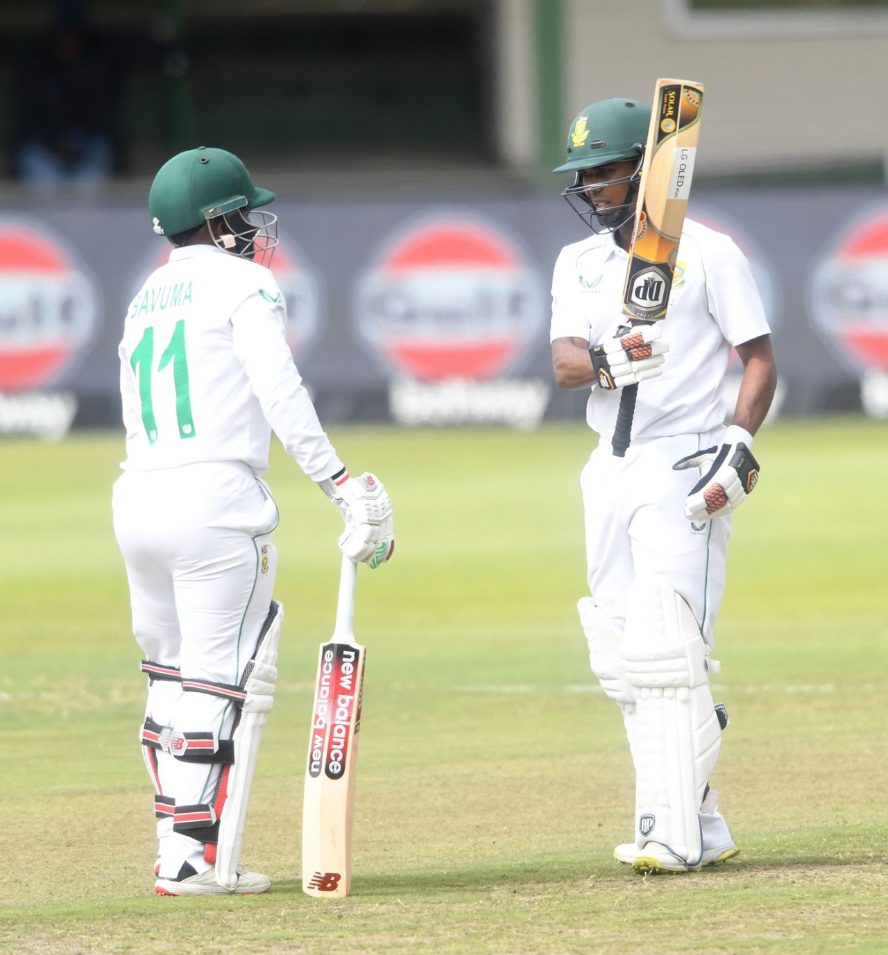 Keegan Petersen raises his bat after reaching his half century, South Africa v Bangladesh, 2nd Test, Gqeberha, 1st day, April 8, 2022