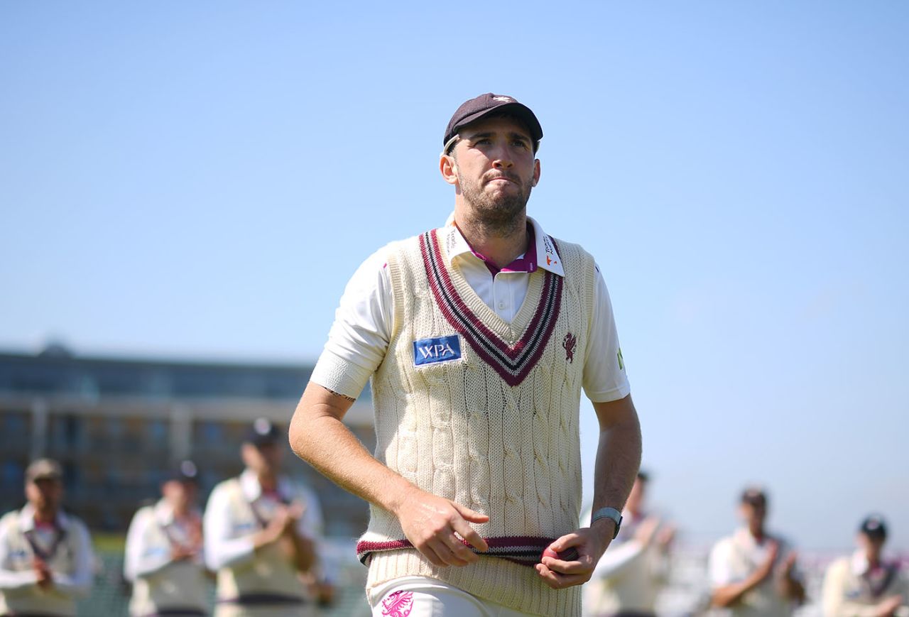Craig Overton leads Somerset off after taking a career-best 7 for 57, Somerset vs Essex, LV= Insurance County Championship division one, 1st day, Taunton, April 15, 2022