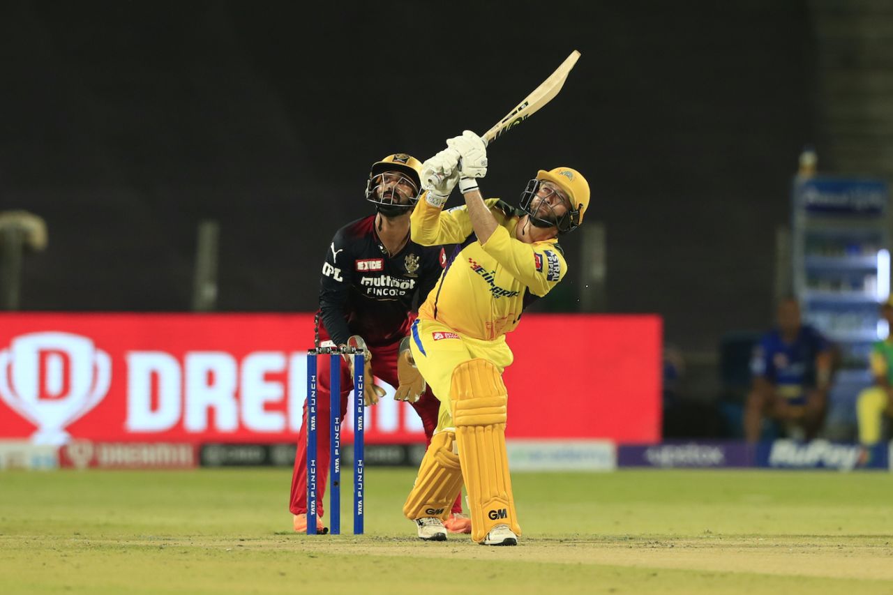 Devon Conway launches a ball to the legside in CSK's chase against RCB, Chennai Super Kings vs Royal Challengers Bangalore, IPL 2022, Pune, May 4, 2022