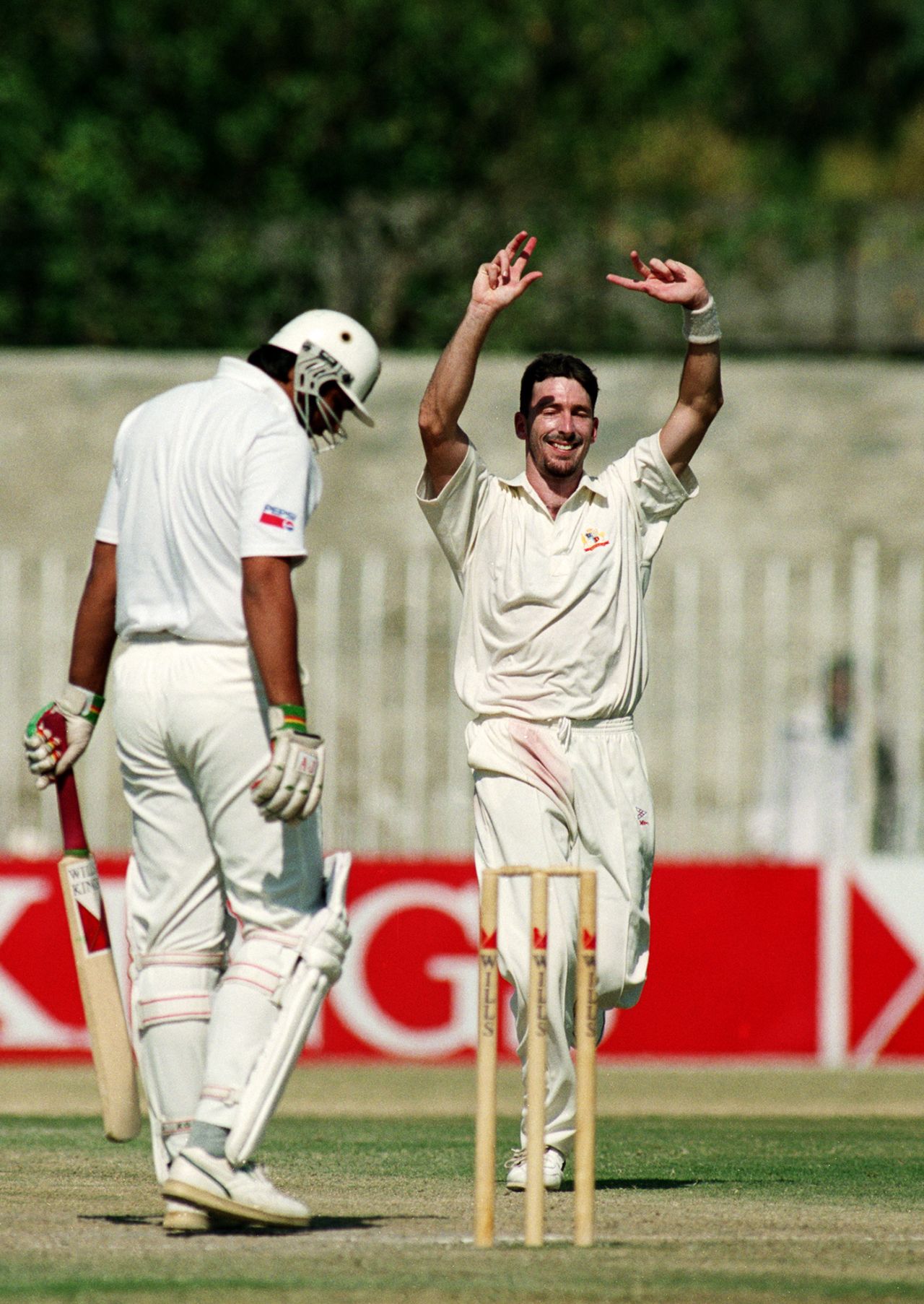 Damien Fleming celebrates Inzamam-ul-Haq's wicket. He became the third bowler to take a hat-trick on Test debut, Pakistan v Australia, 2nd Test, Rawalpindi, 5th day, October 9, 1994
