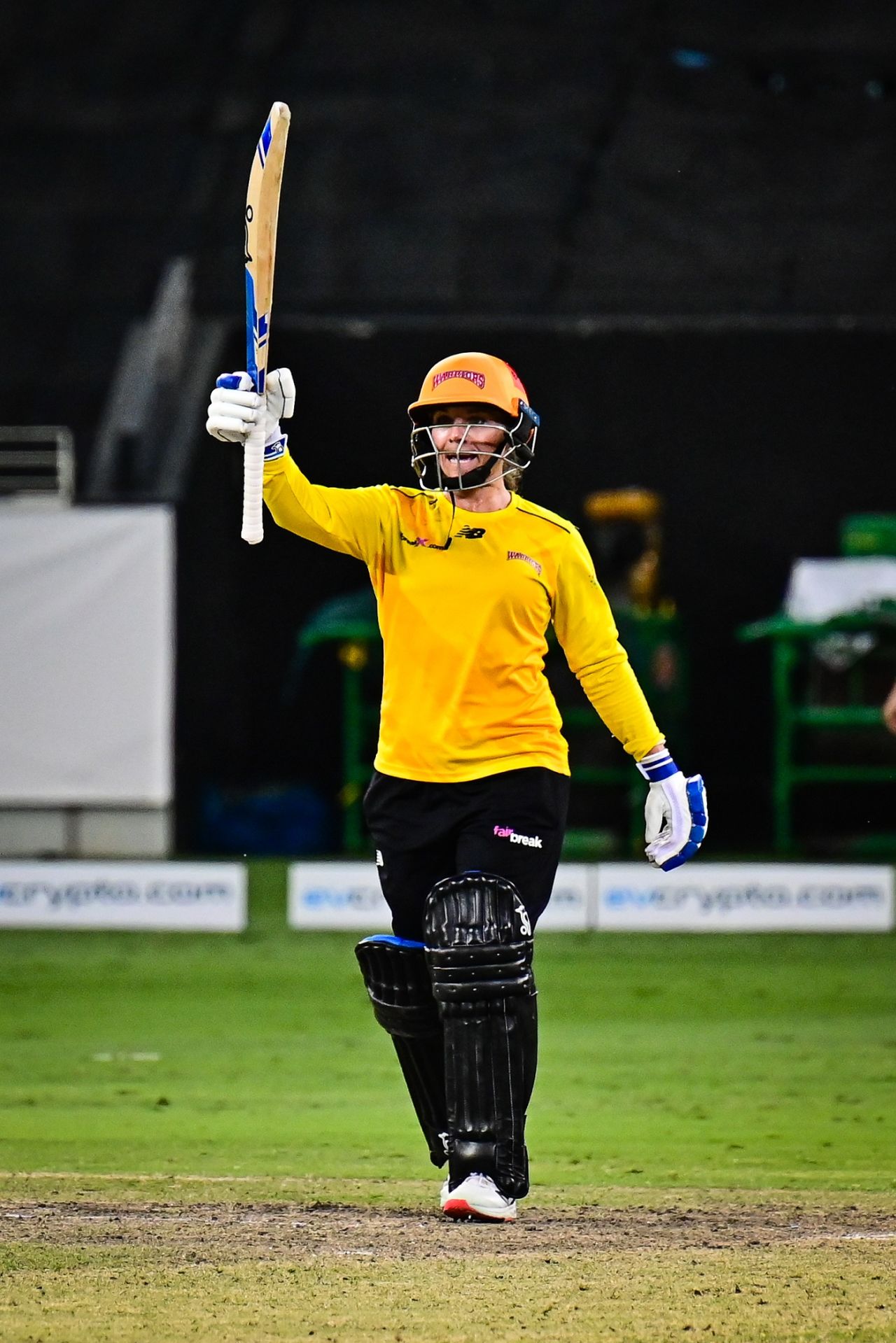 Mignon du Preez raises her bat after scoring her half-century, Warriors vs Barmy Army, Dubai, FairBreak Invitational Tournament 2022, May 12, 2022
