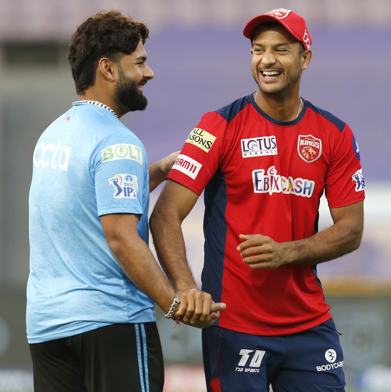 Rishabh Pant and Mayank Agarwal share a laugh as the teams warm up, Delhi Capitals vs Punjab Kings, IPL 2022, DY Patil Stadium, Mumbai, May 16, 2022
