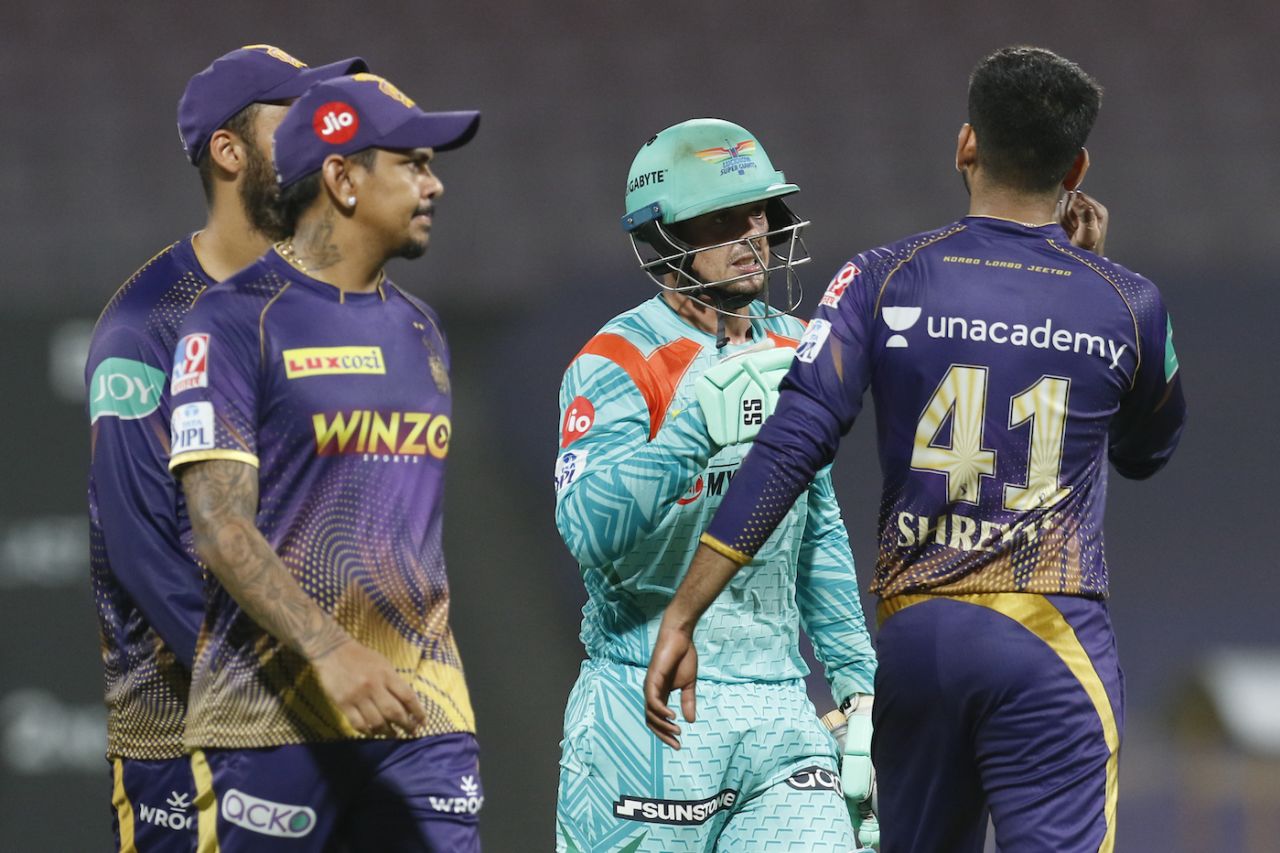 The Knight Riders players, smashed for 140 runs in 70 balls by Quinton de Kock, congratulate their tormentor, Kolkata Knight Riders vs Lucknow Super Giants, IPL 2022, DY Patil Stadium, Mumbai, May 18, 2022