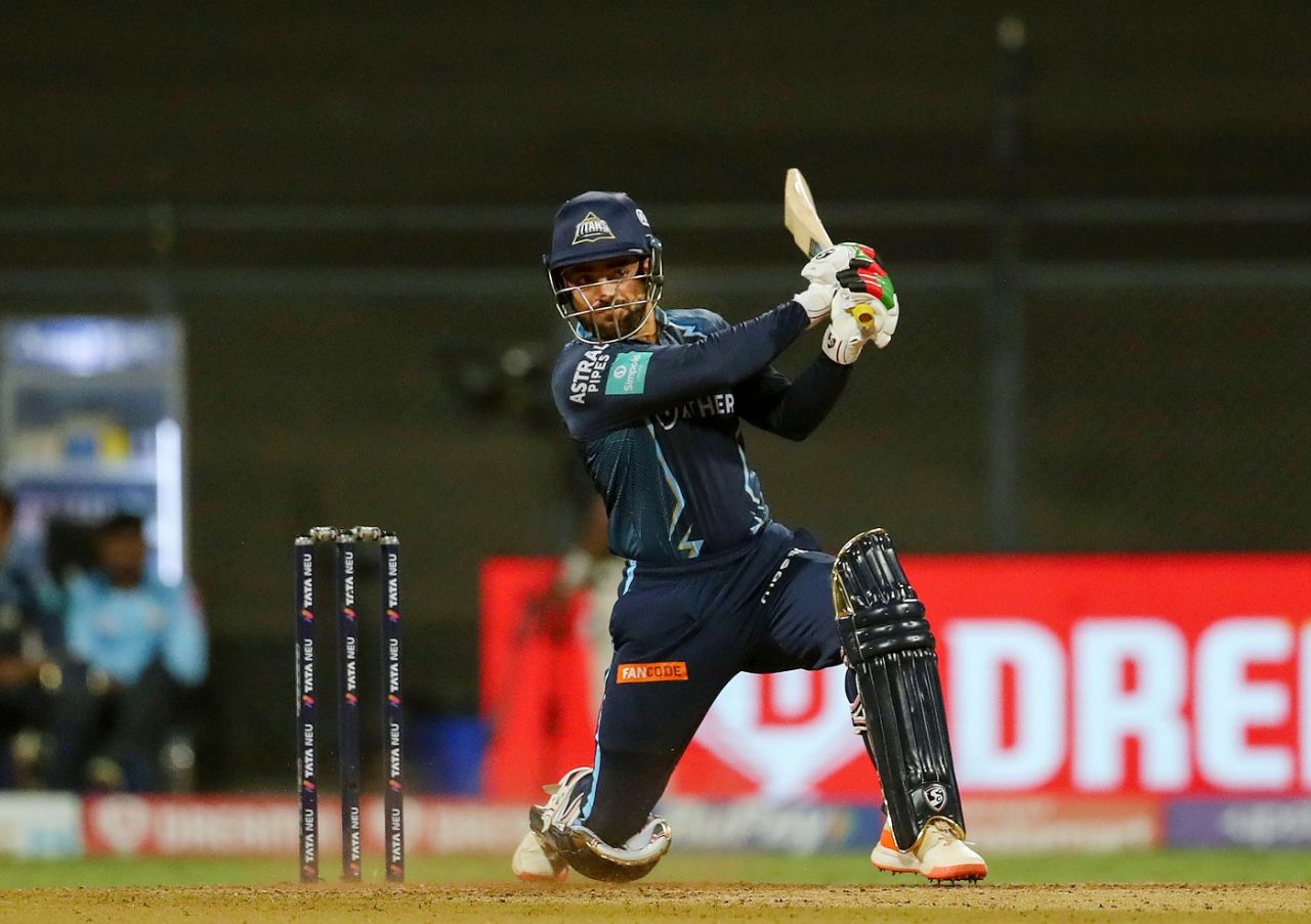 Rashid Khan hits a four down the ground, Royal Challengers Bangalore vs Gujarat Titans, IPL 2022, Wankhede Stadium, Mumbai, May 19, 2022