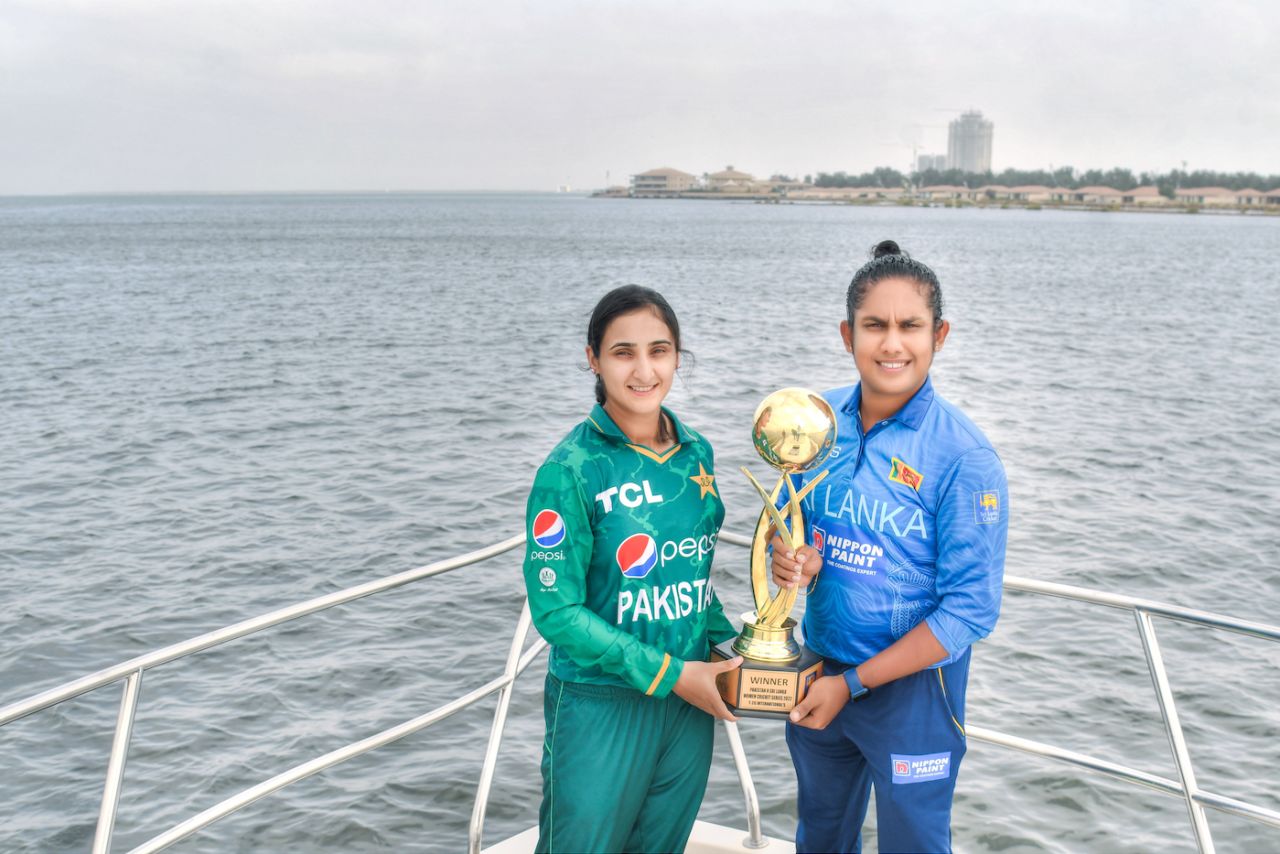 Bismah Maroof and Chamari Athapaththu pose with the trophy they will be fighting for over three T20Is, Karachi, May 23, 2022