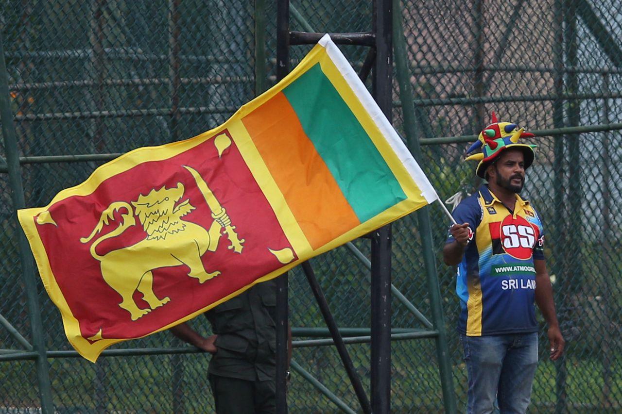 A Sri Lankan cricket fan cheers his team on, Colombo, August 22, 2019