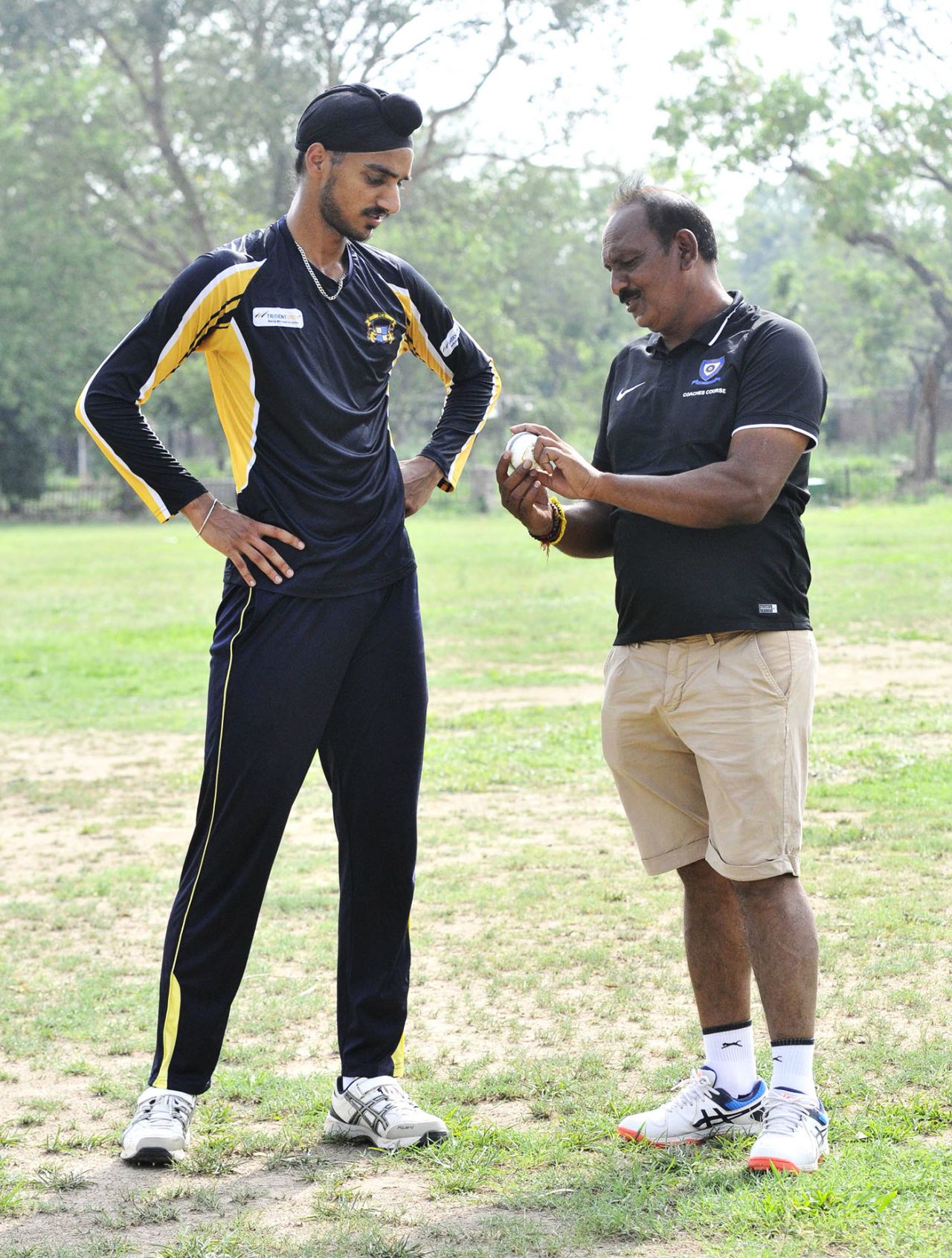 Arshdeep Singh talks to his coach Jaswant Singh, Chandigarh, June 11, 2021