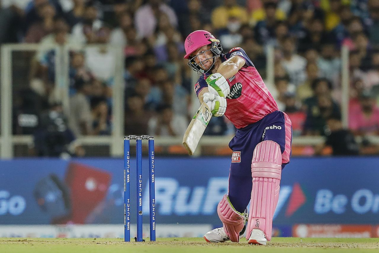 Jos Buttler goes for effectiveness over grace as he hits the ball through cover, Gujarat Titans vs Rajasthan Royals, IPL 2022 Final, Ahmedabad, May 29, 2022
