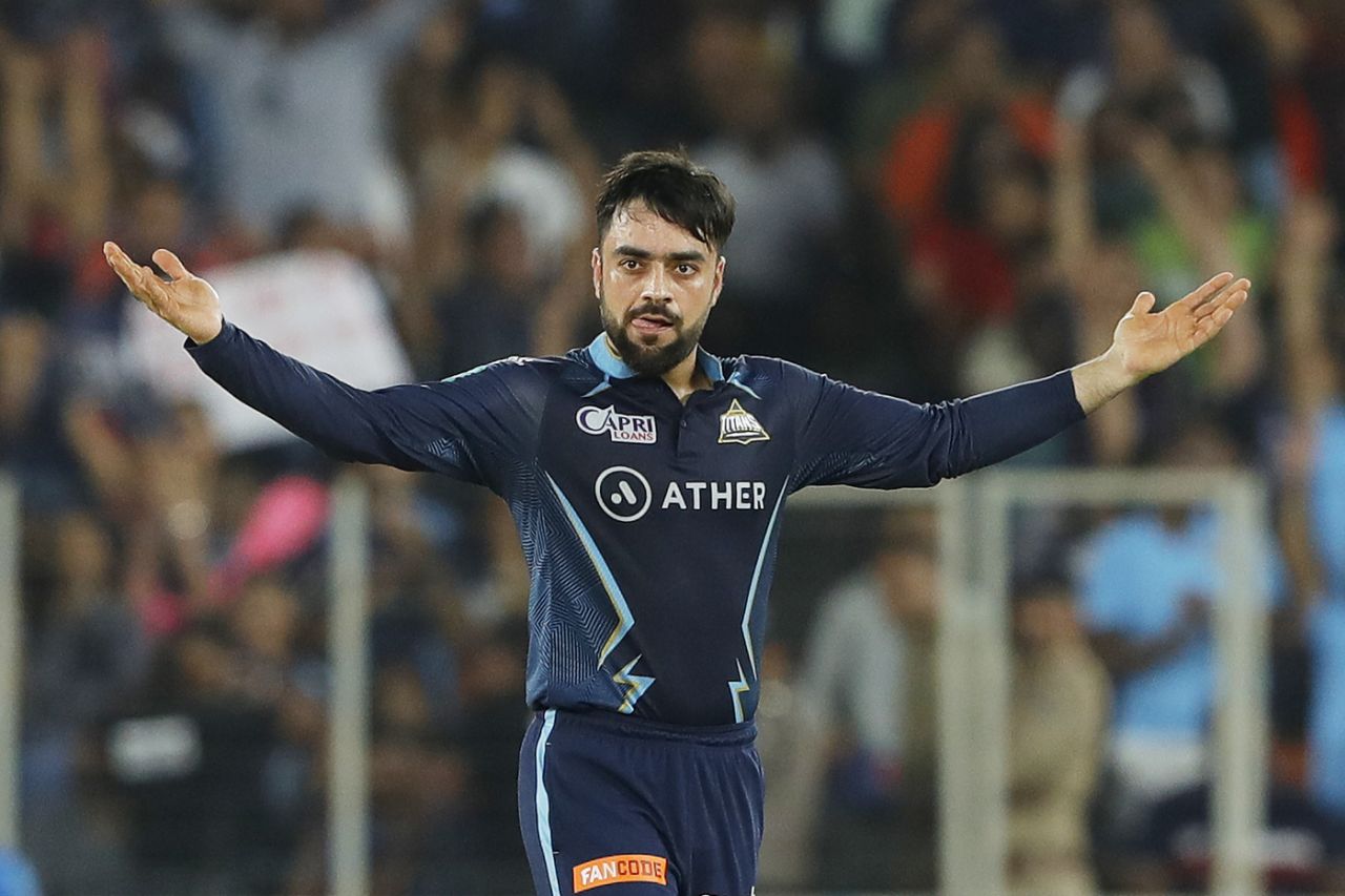 Rashid Khan - seen here celebrating the wicket of Devdutt Padikkal - bowled his four overs for 18 runs, Gujarat Titans vs Rajasthan Royals, IPL 2022, final, Ahmedabad, May 29, 2022