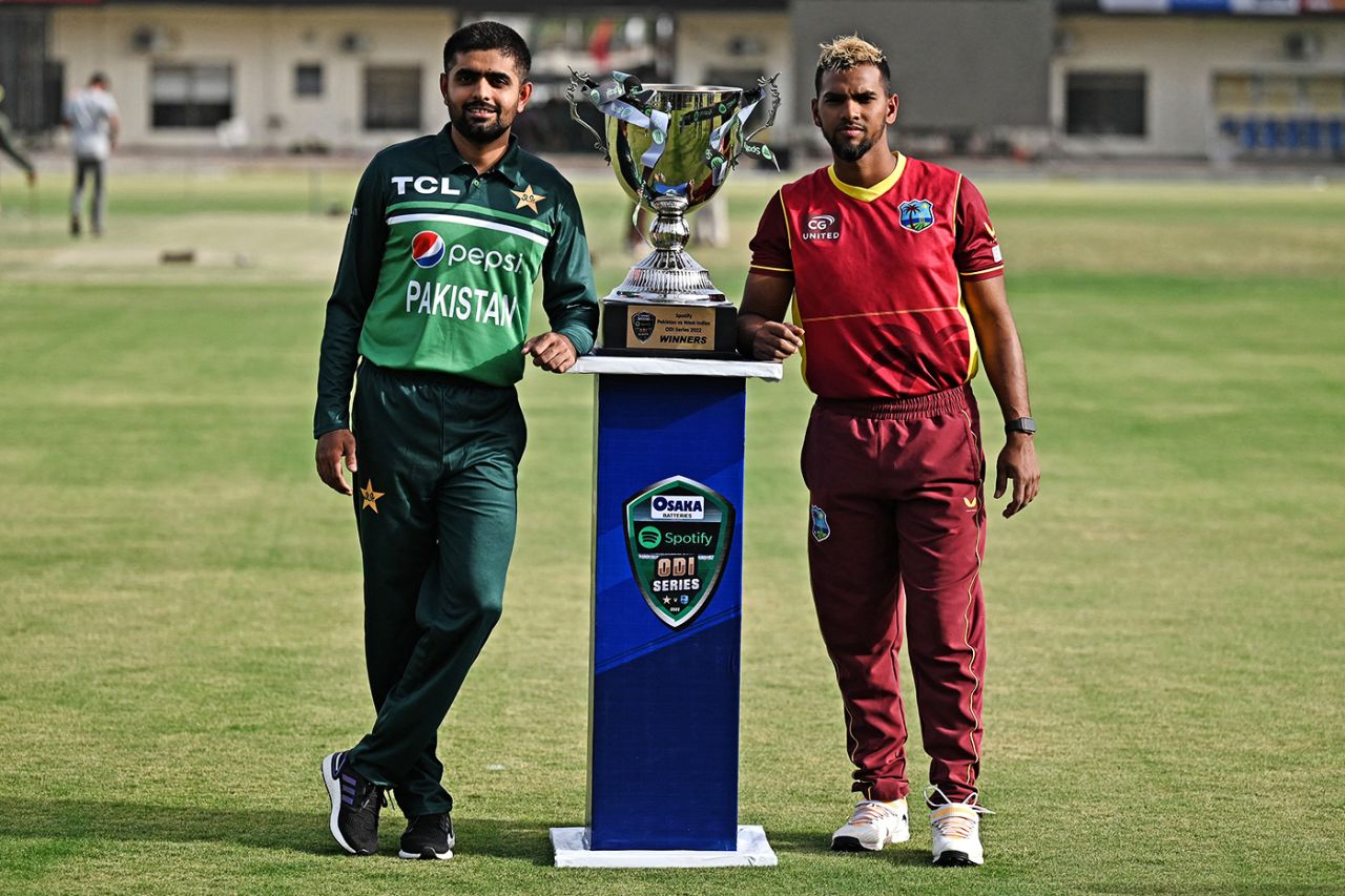 Babar Azam and Nicholas Pooran pose with the series trophy, Multan, June 7, 2022