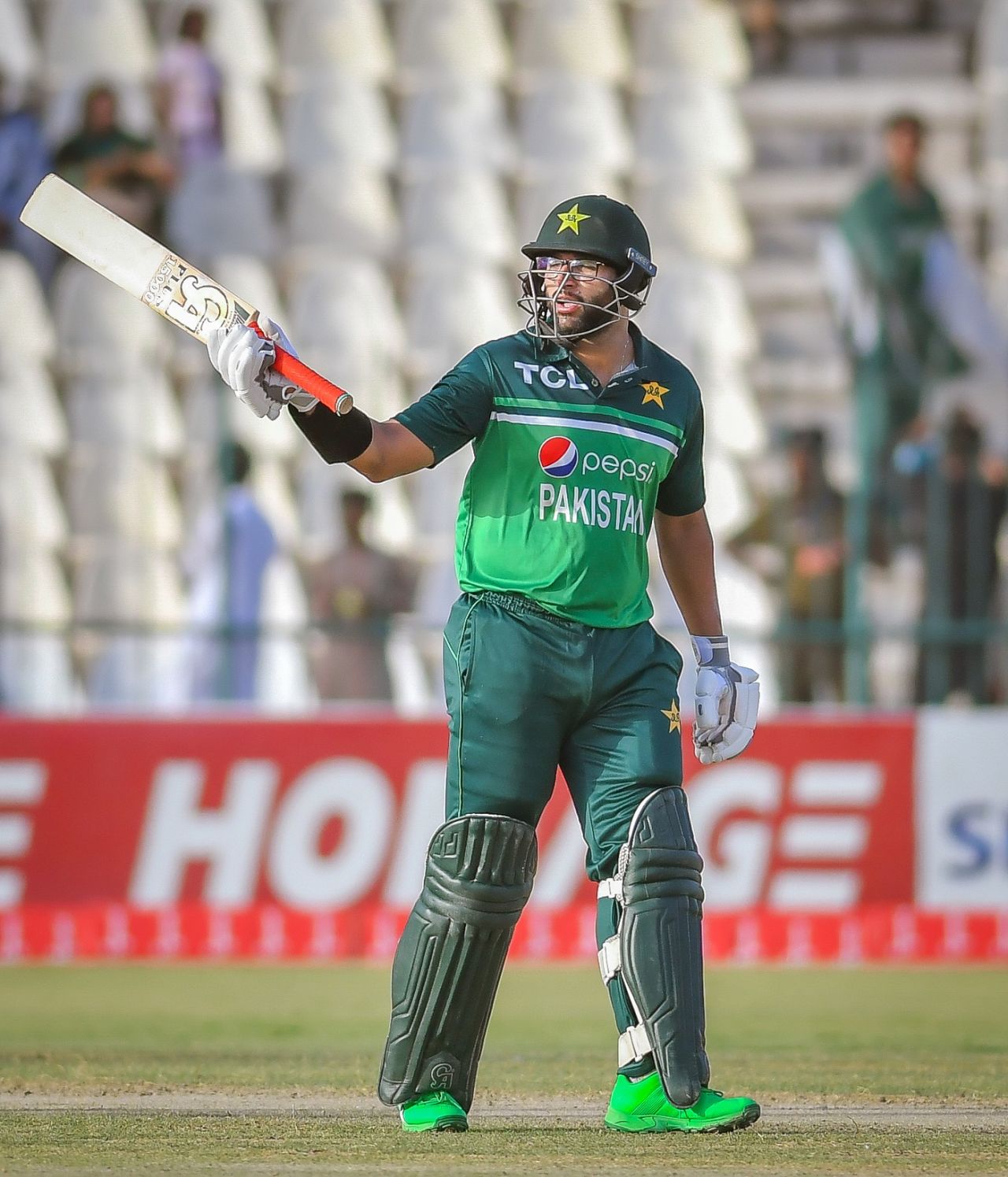 Imam-ul-Haq raises his bat after completing his half-century, Pakistan vs West Indies, 2nd ODI, Multan, June 10, 2022