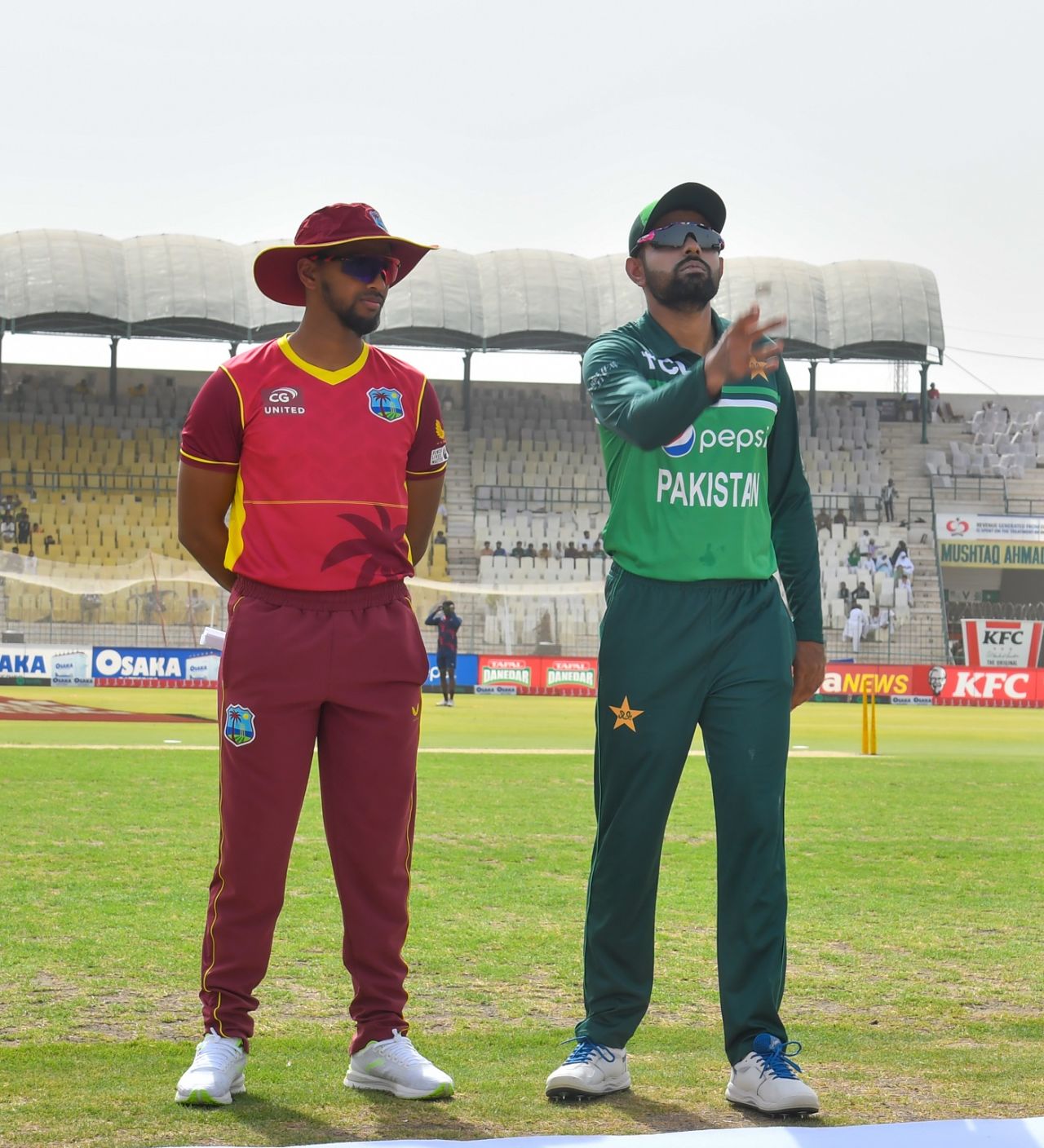 Nicholas Pooran watches as Babar Azam spins the coin, Pakistan vs West Indies, 3rd men's ODI, Multan, June 12, 2022