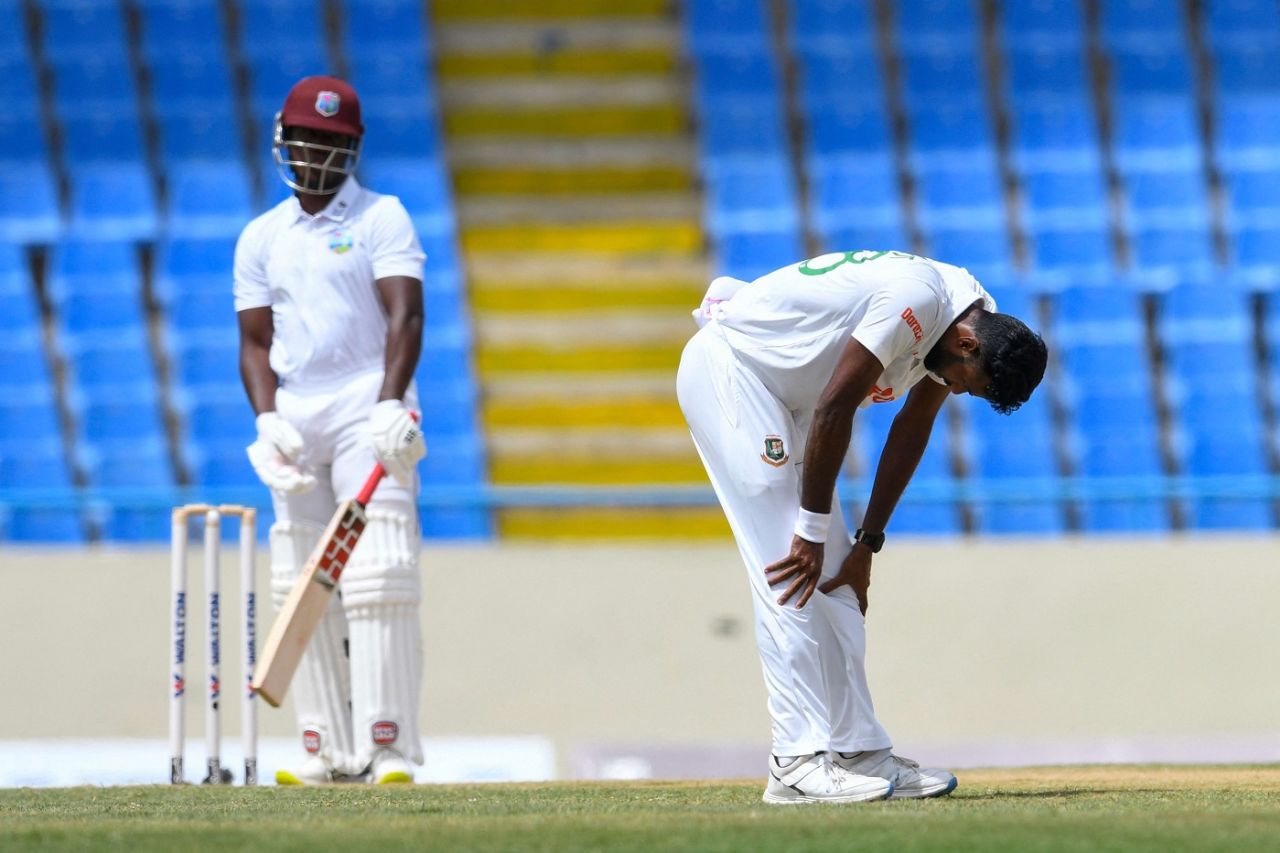 A dejected Ebadot Hossain is on his haunches after an umpire's decision goes against him, West Indies vs Bangladesh, 1st Test, Antigua, 2nd day, June 17, 2022